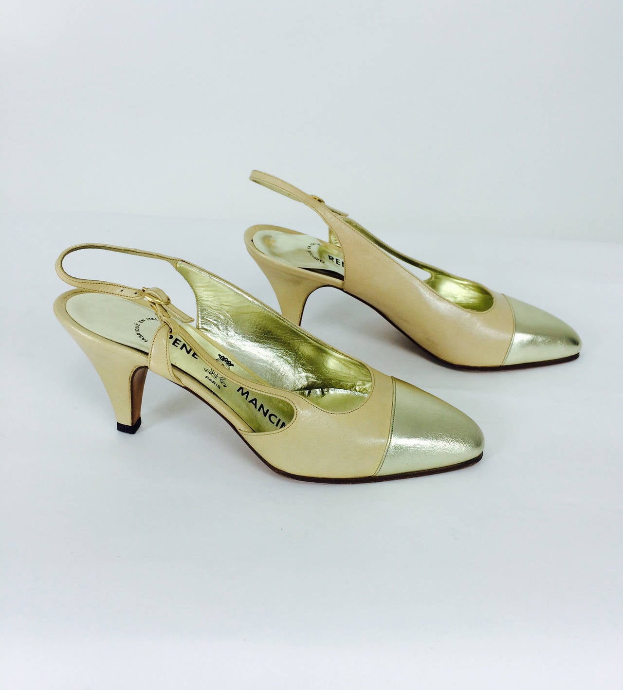 Rene' Mancini bone & gold leather sling back pumps 1970s...Marked size 36 M/N...Unworn and in excellent condition with the original box...