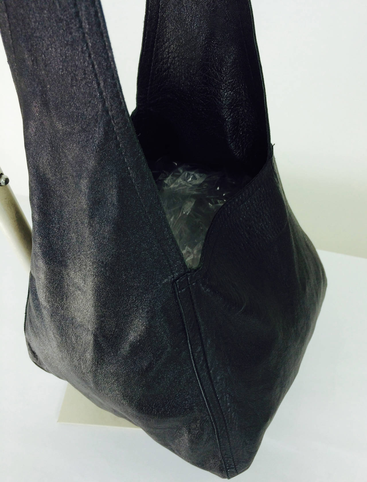 Halston black soft leather shoulder bag cover feature WWD Nov. 4, 1974 3