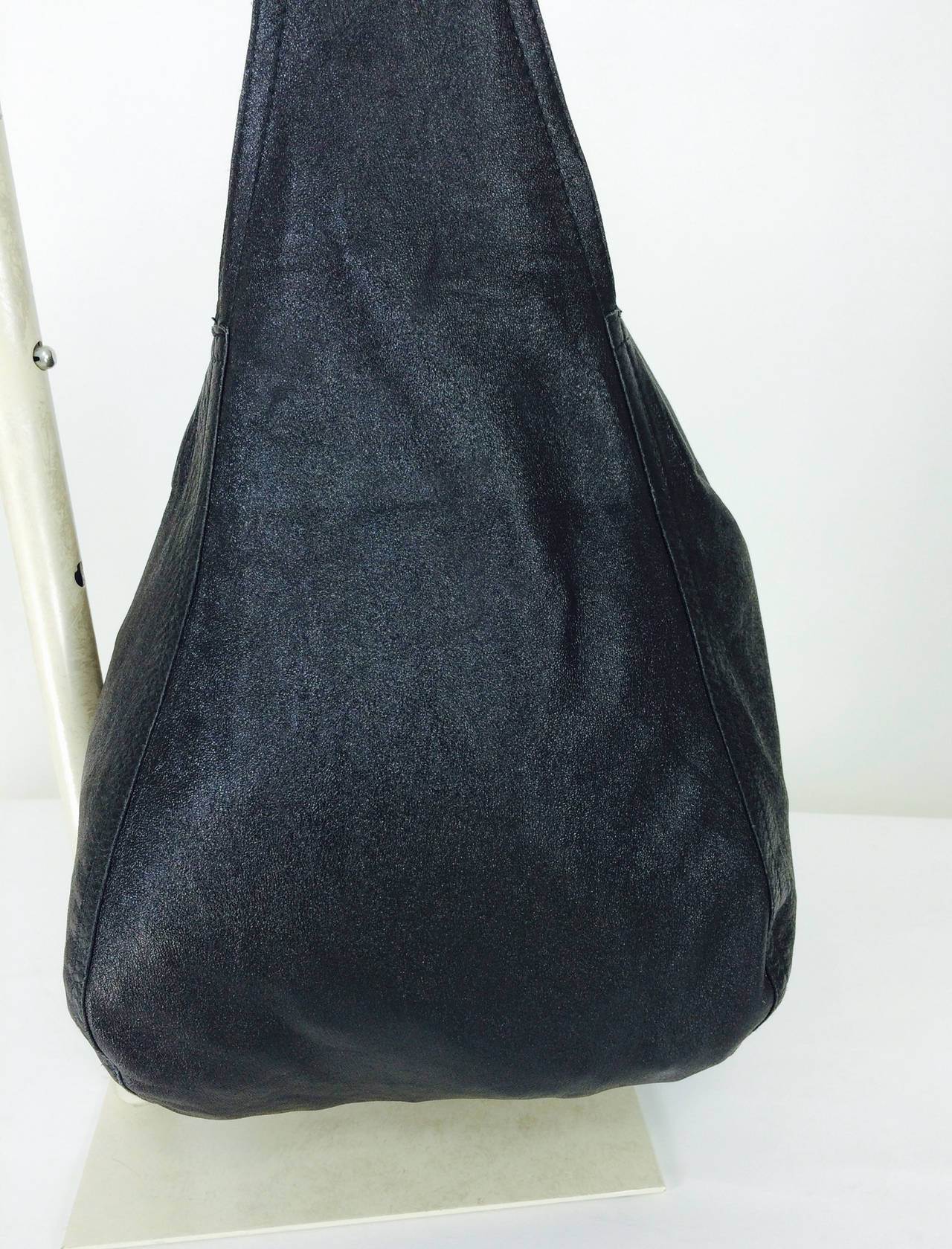 Halston black soft leather shoulder bag cover feature WWD Nov. 4, 1974 2
