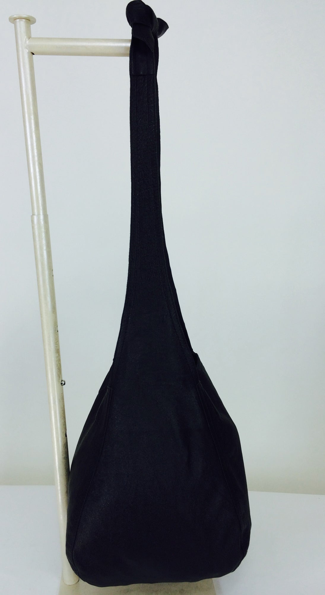 Halston black soft leather shoulder bag cover feature WWD Nov. 4, 1974 1