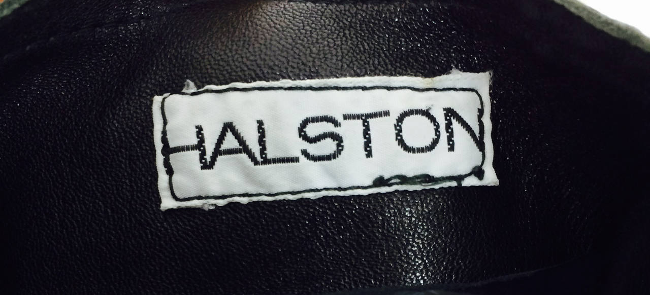 Women's Halston black soft leather shoulder bag cover feature WWD Nov. 4, 1974