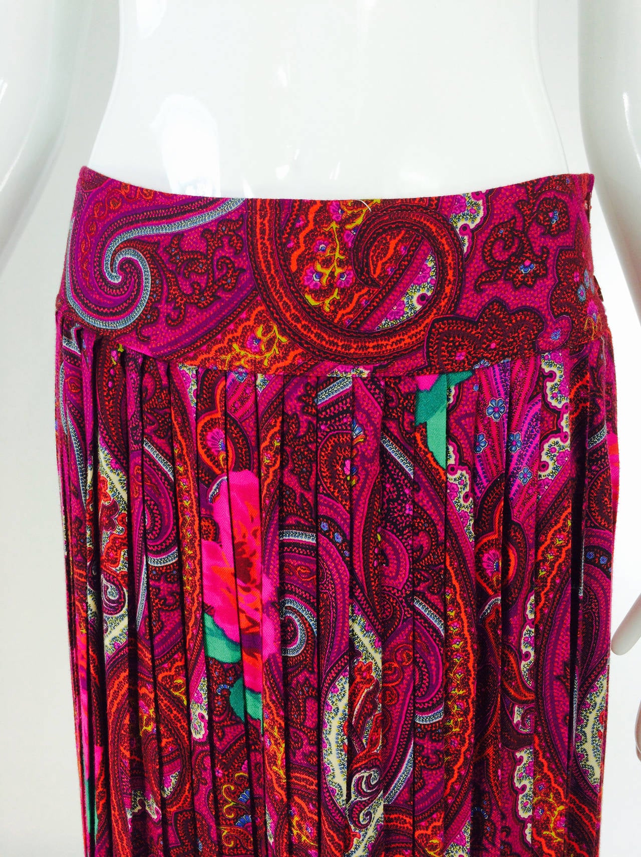 Kenzo bright paisley mix print midi skirt 1980s...Super fine challis wool in a bright paisley print interspersed with large roses...done in reds, hot pinks, bright green with touches of black & white, the border of the skirt is done in red florals