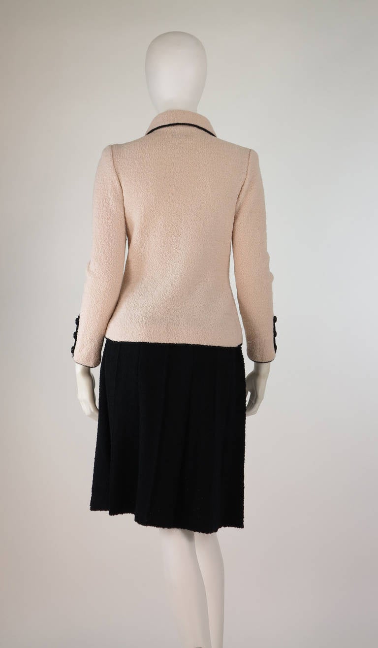 1960s Adolfo classic boucle suit in pink & black 1