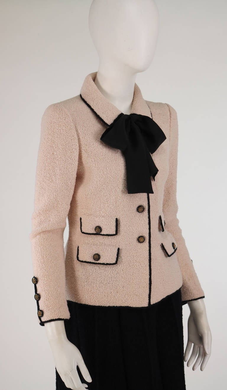 1960s Adolfo classic boucle suit in pink & black 3