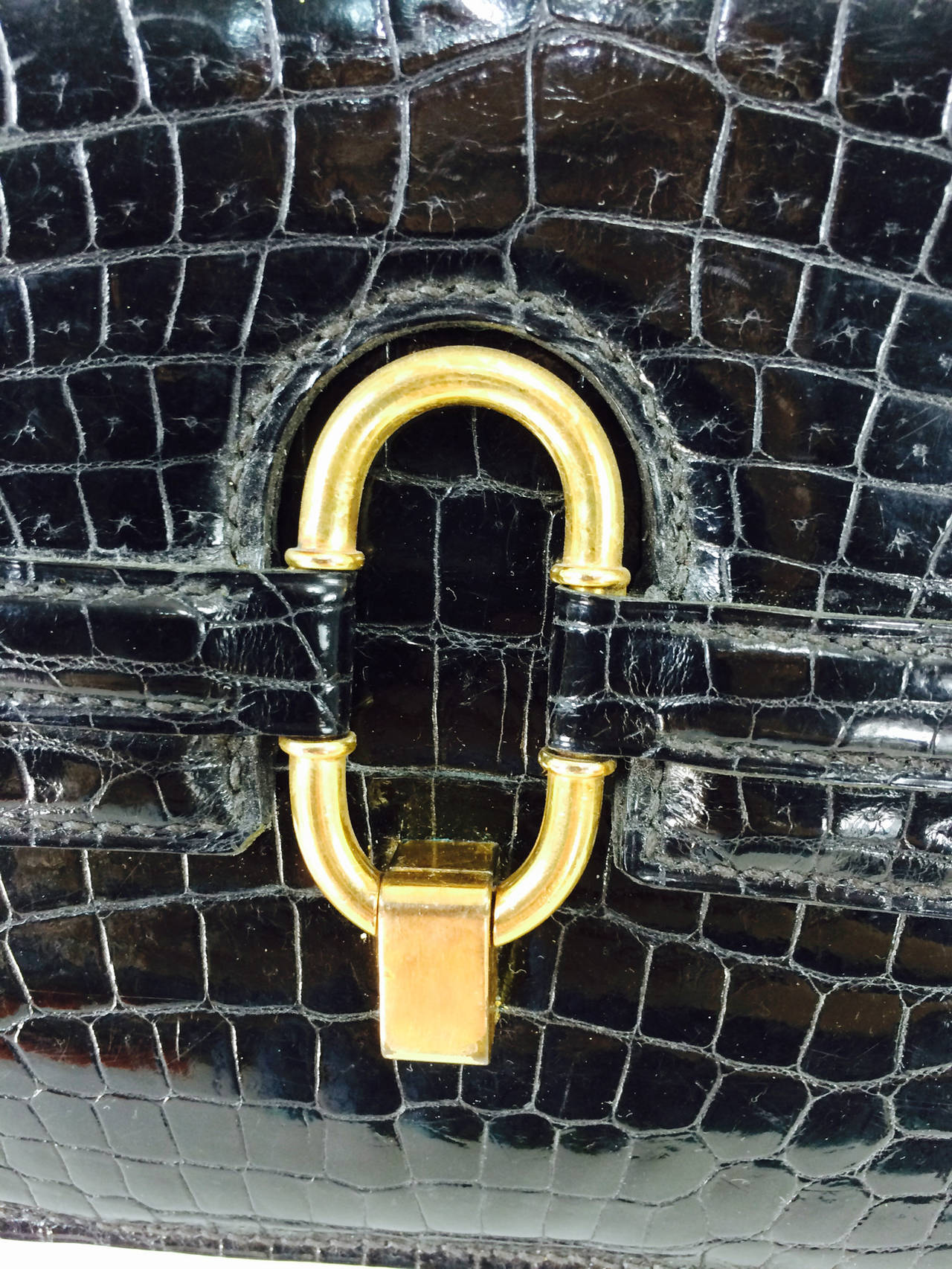 Crocodile shoulder bag with glazed black skins & gold plated hardware 1970s 1