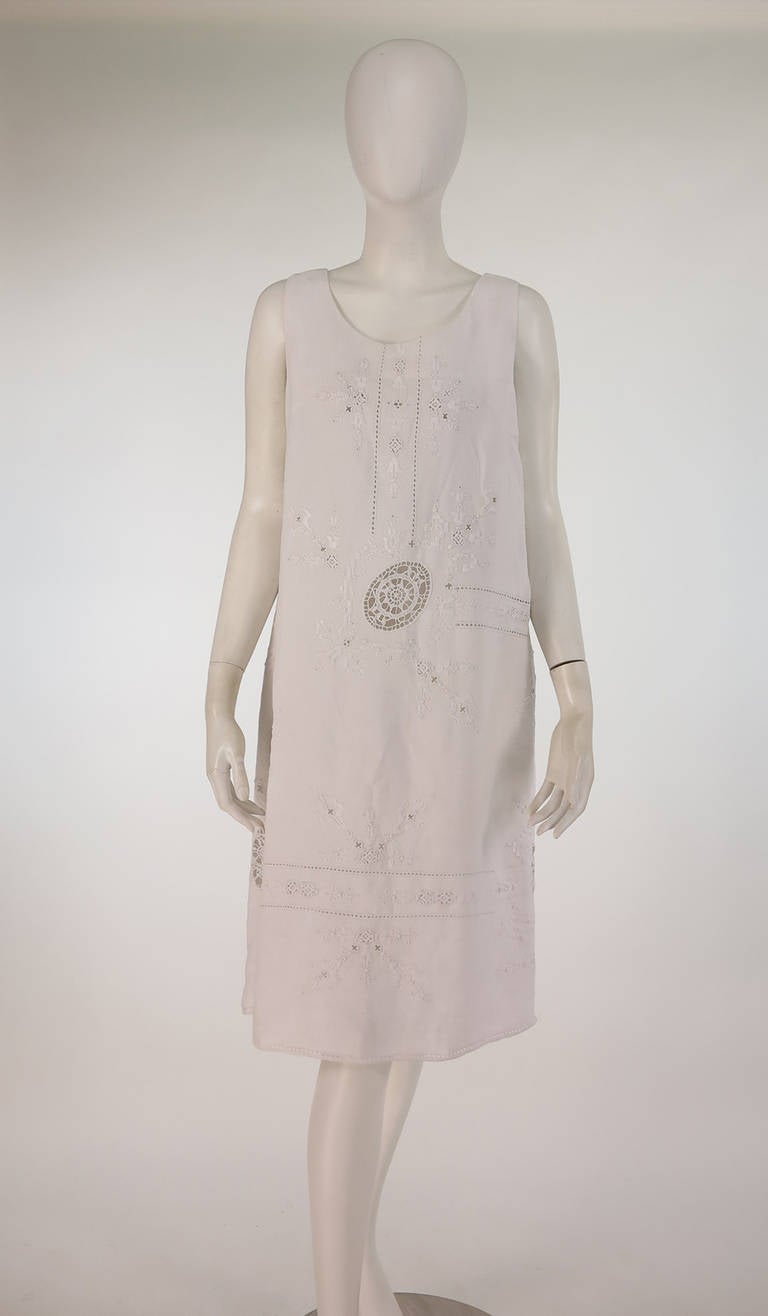 From the late 1950s or early 1960s a heavily embroidered linen coat & matching dress with Reticella lace insertion...Both pieces showcase the needle workers art and would make a lovely alternative wedding ensemble...Simple sleeveless shift dress