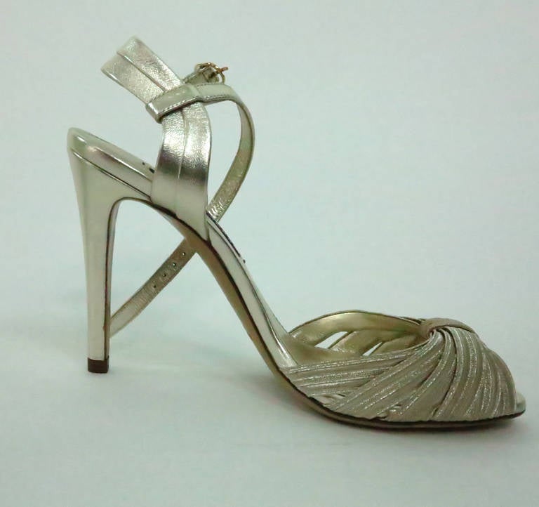 Ralph Lauren Collection silver 1930s inspired evening sandals...Open toe with ankle straps...Classic style...Marked size 7B...In excellent unworn condition.