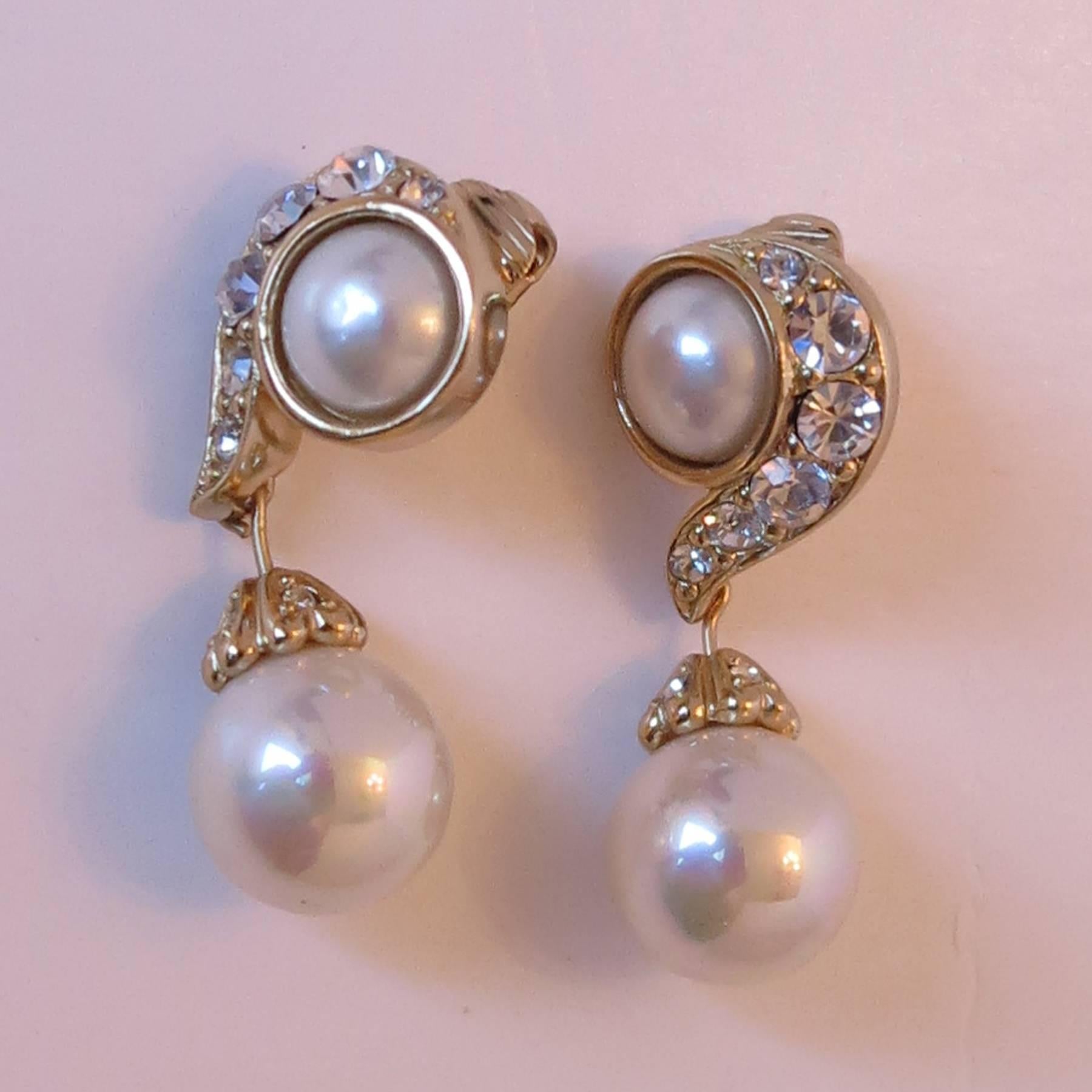 Christian Dior rhinestone & pearl drop clip on earrings...Bezel set pearl with a 