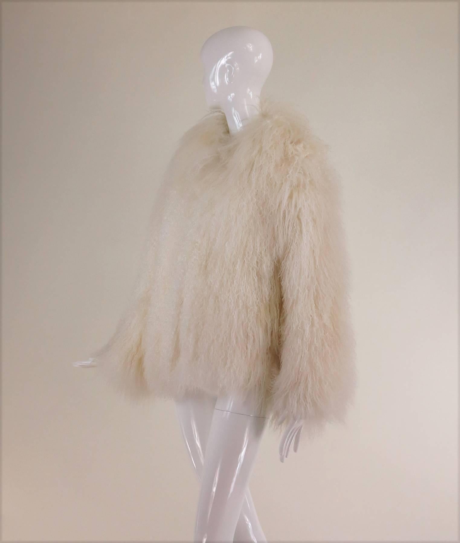 Mongolian lamb fur jacket in white Marvin Richards 1980s Unworn...Beautiful silky soft white Mongolian lamb fur jacket from the 1980s labeled Marvin Richards...Closes at the front with fur hooks...This coat is unworn and in excellent condition, the