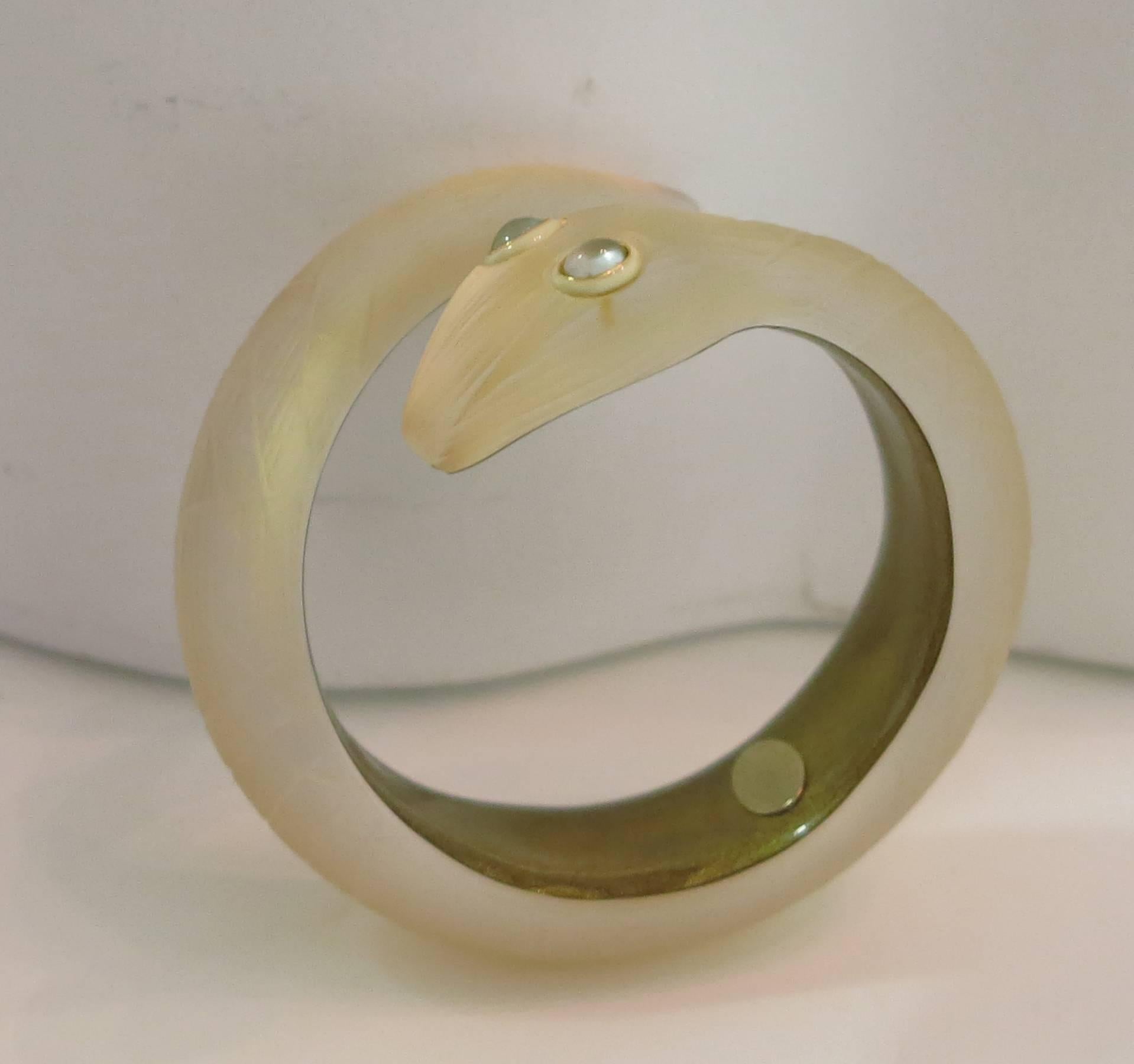 Women's Alexis Bittar hand carved gold Lucite snake bracelet 
