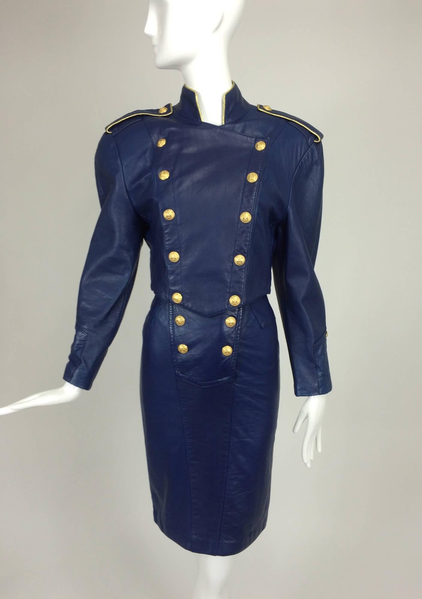 North Beach navy Leather double breasted dress & jacket 1980s...The fitted strapless dress closes at the front with a double row of gold snaps, the back features a short band at the waist with two gold buttons, there is a 7 1/2