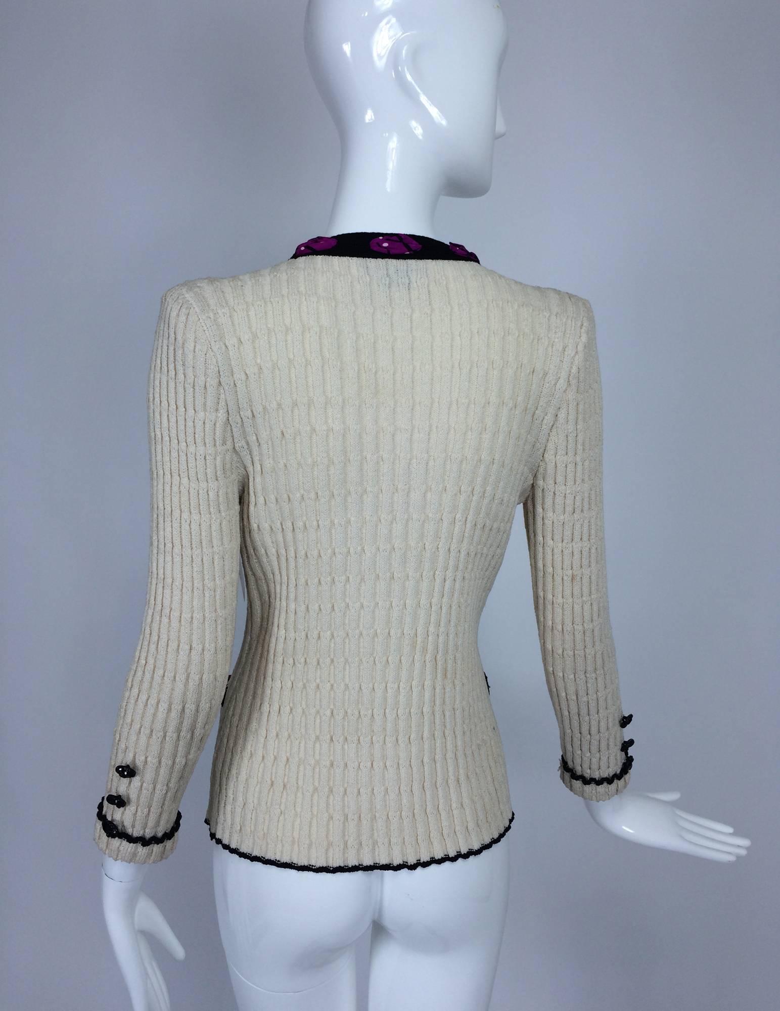 Adolfo cream cable knit rosette trimmed cardigan sweater/jacket 1970s In Excellent Condition In West Palm Beach, FL
