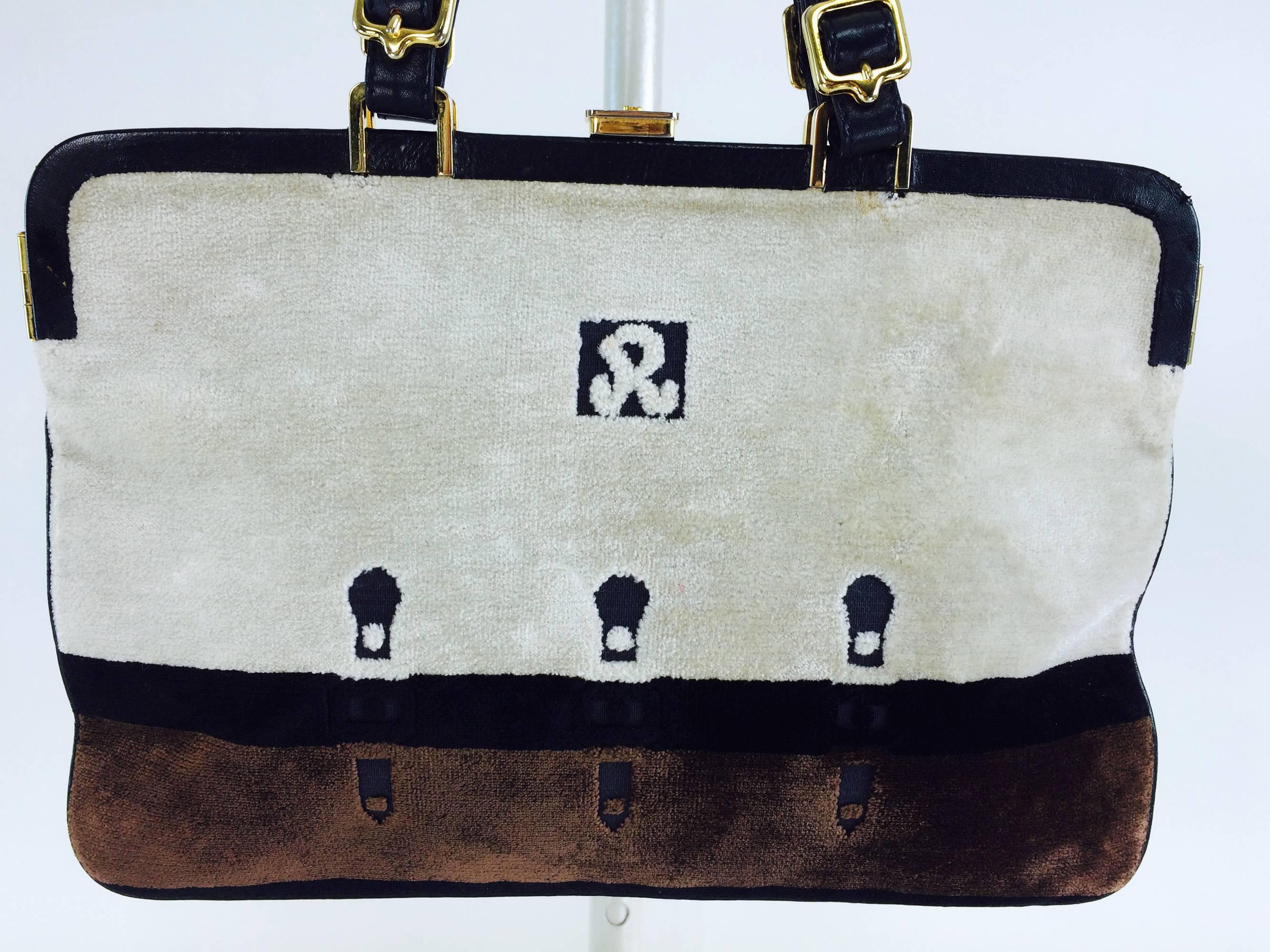 Roberta di Camerino cream, black & chocolate brown frame handbag 1970s...Cream, black and chocolate brown handbag with double leather handles that have gold buckles, the bag opens with a gold logo clasp, the frame is trimmed in black leather...The