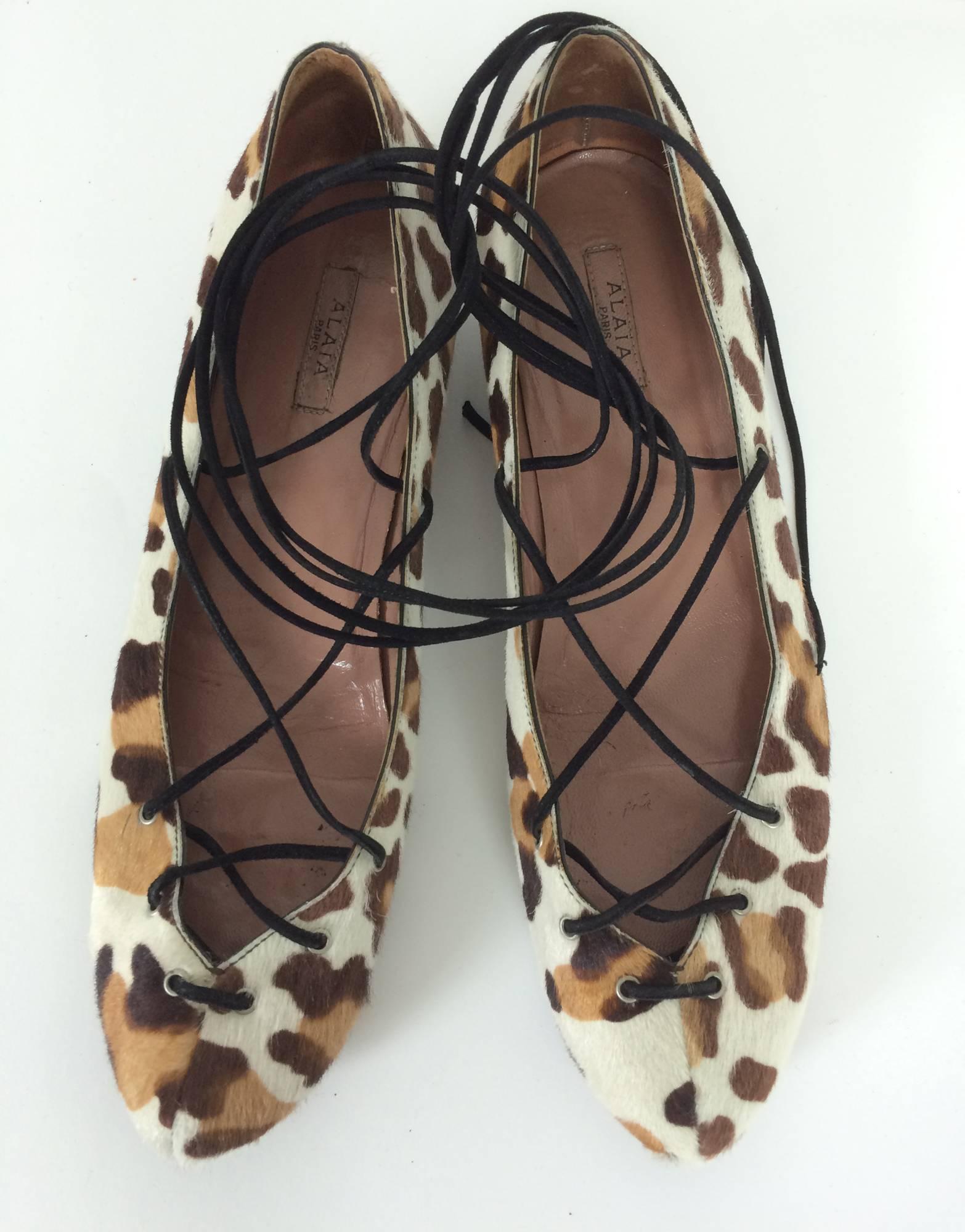 Alaia leopard print hair calf lace up ballet flats, leather lined...Cream with brown and black spots, the shoes have a peaked toe and show toe cleavage...lace with black suede laces...Marked size 38 1/2   In very good condition