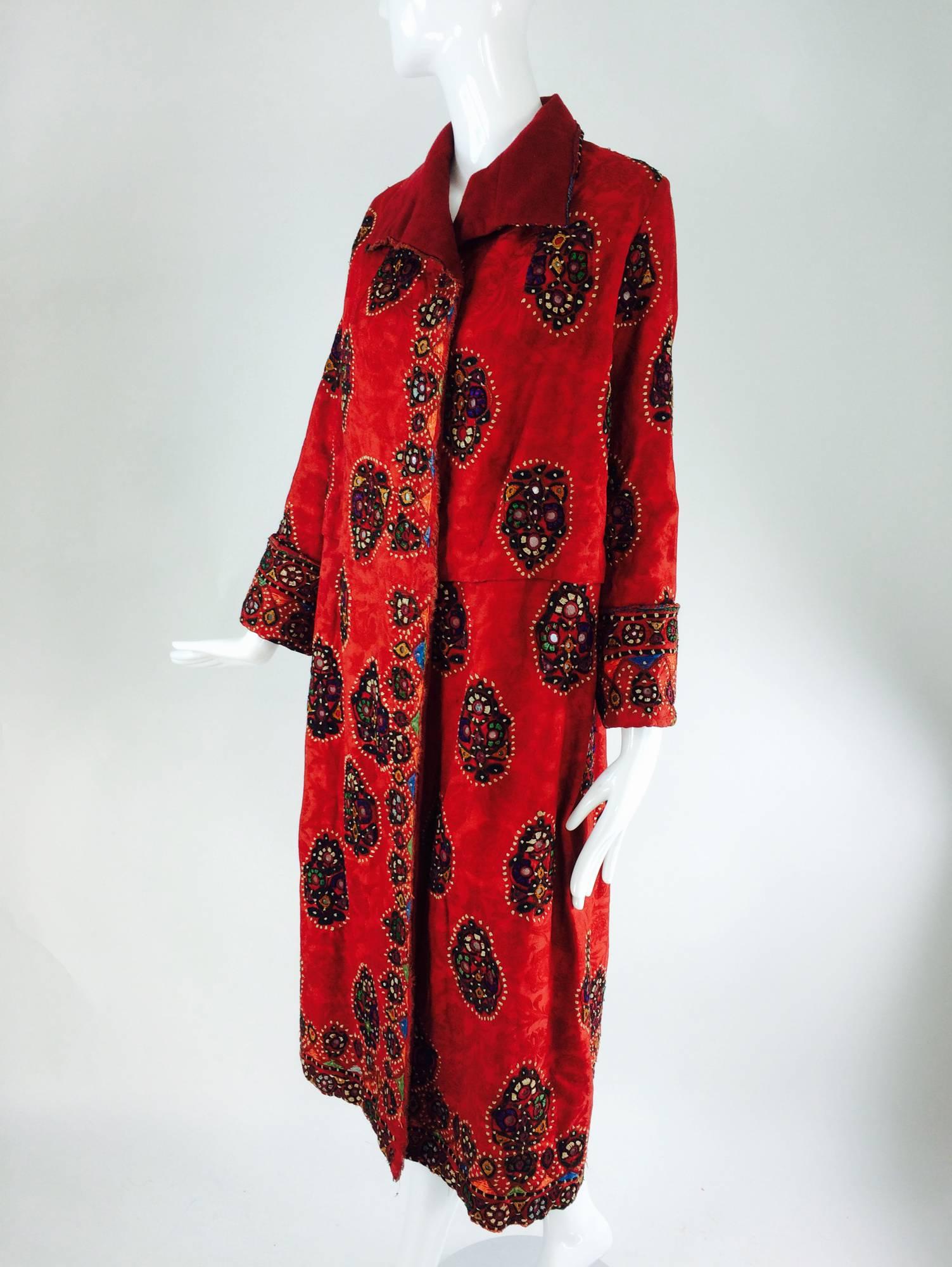 1920s Shisha (mirror embroidery) embroidered flapper style coat India...Beautifully embroidered coat done on a cotton damask fabric in a pomegranate colour...Embroidered medallions are scattered throughout the coat and are done in a fine buttonhole