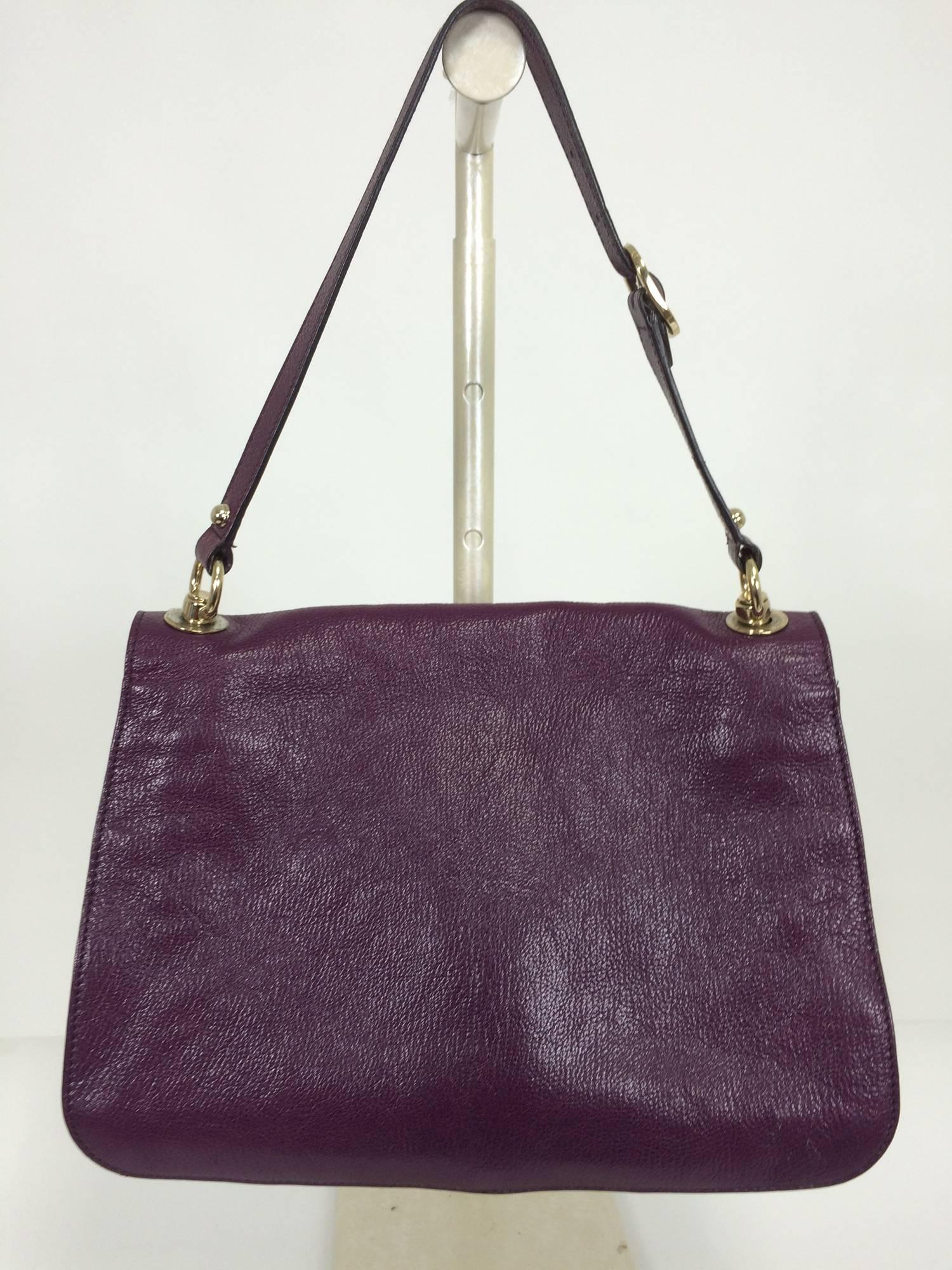 Gucci Blondie rare plum glazed leather shoulder handbag gold hardware...Rare plum colour glazed leather...Adjustable shoulder strap...Large gold GG logo on the front flap, (see photos as there is a 