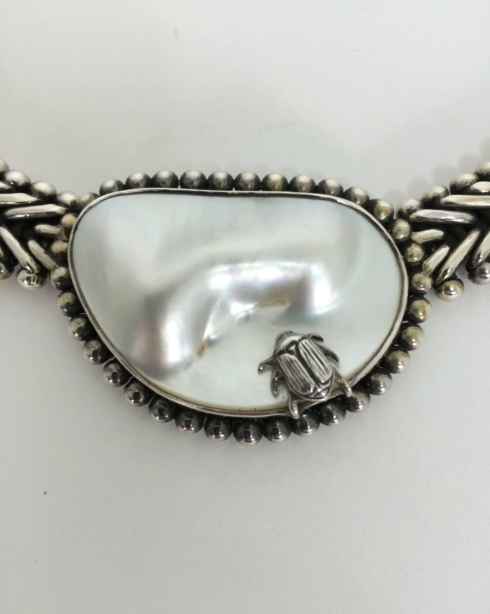 Stephen Dweck sterling silver blister pearl with beetle necklace one of a kind...Dated 1999 and signed, marked one of a kind....This beautifully worked sterling silver chain features a large bezel set blister pearl center medallion that has a