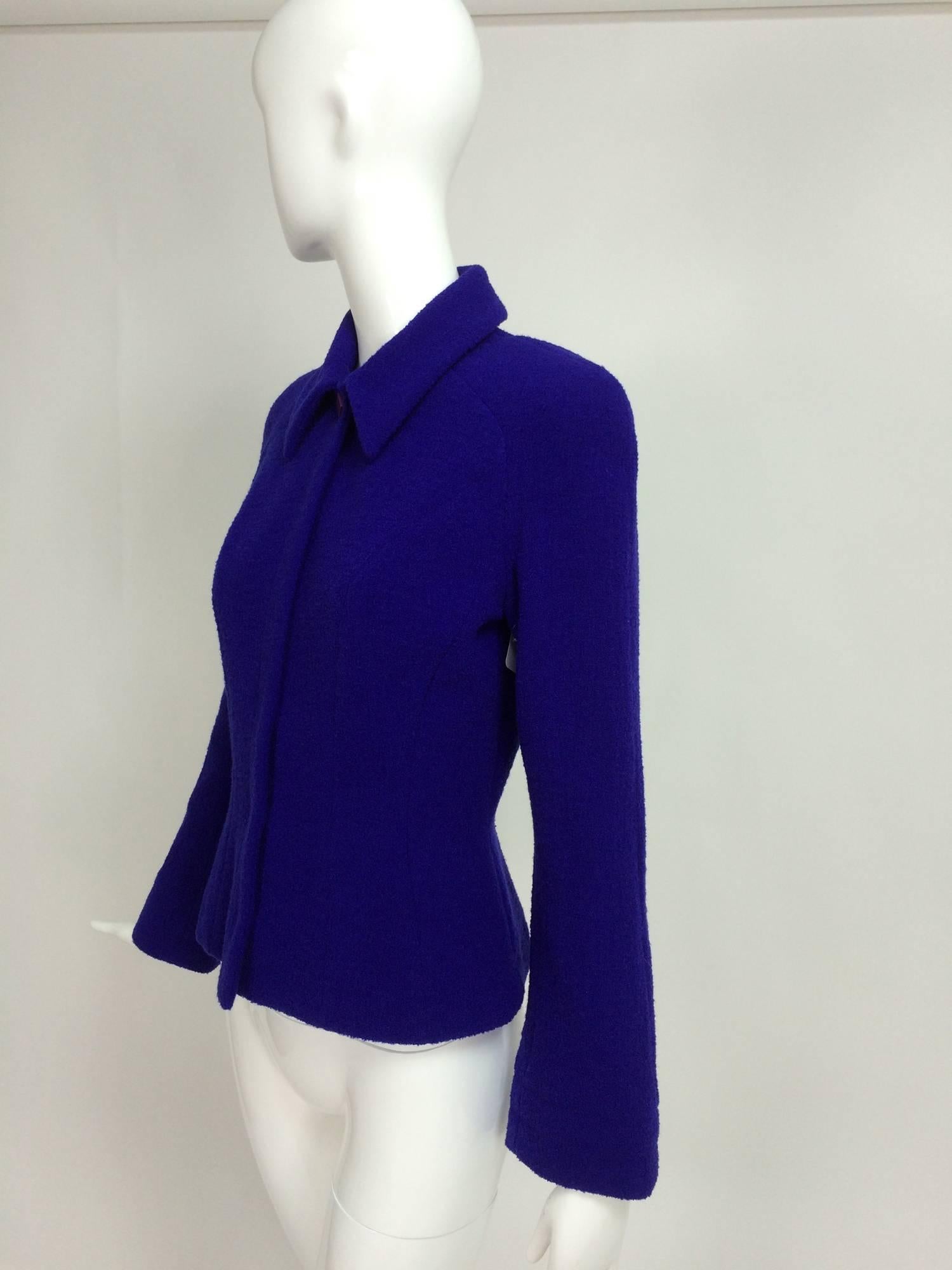 Thierry Mugler purple boucle fitted jacket 36...Textured boucle knit with stretch...Raglan sleeve with slightly padded shoulder...Great seaming details...Closes at the front with a placket and hidden snaps...Long sleeves with a straight stitched