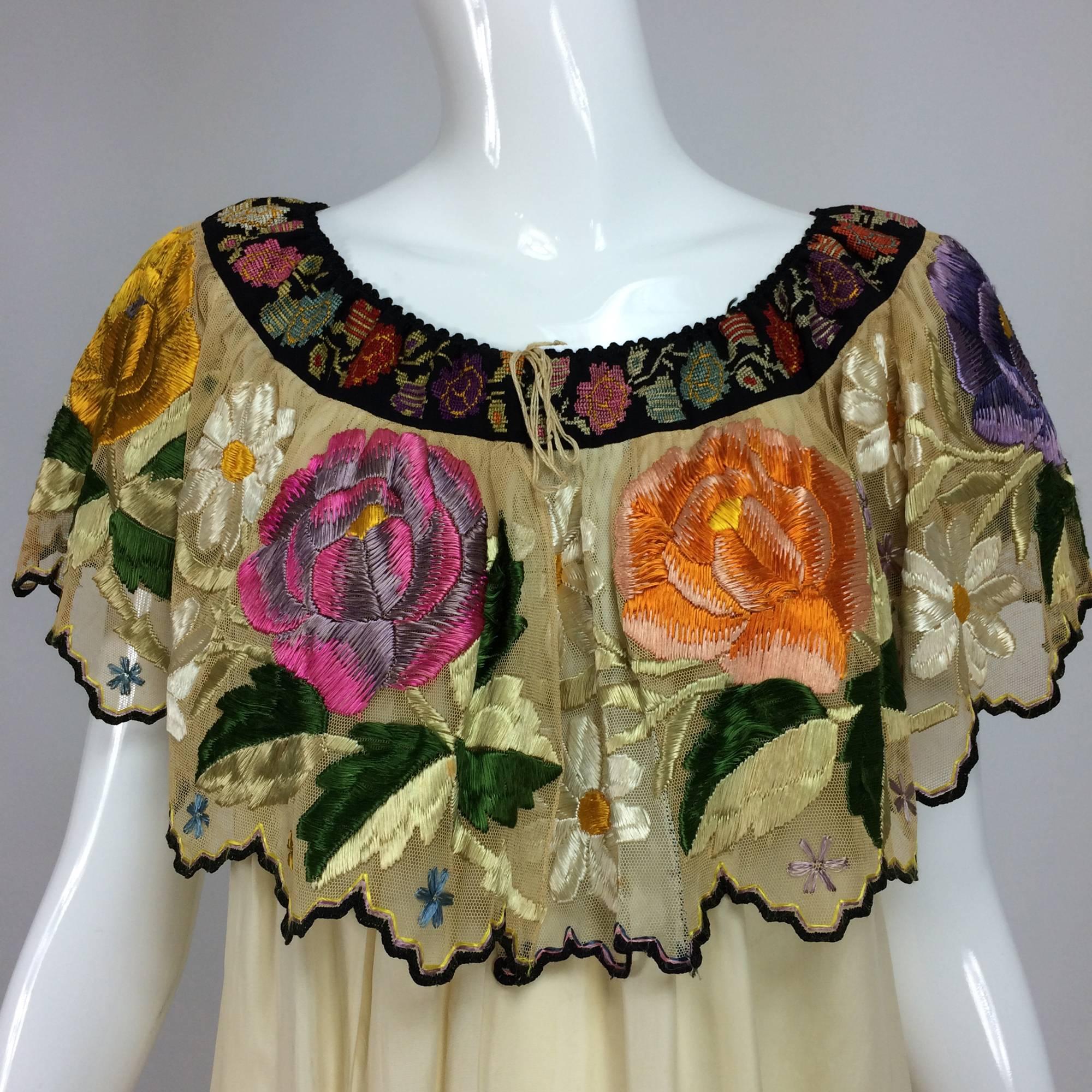 Vintage Mexican silk needlepoint & embroidered peasant blouse 1940s...From the 1940s this blouse is a tribute to the embroiderers art, starting at the neckline, there is a wide band of black needle point with brightly coloured flowers (there is a