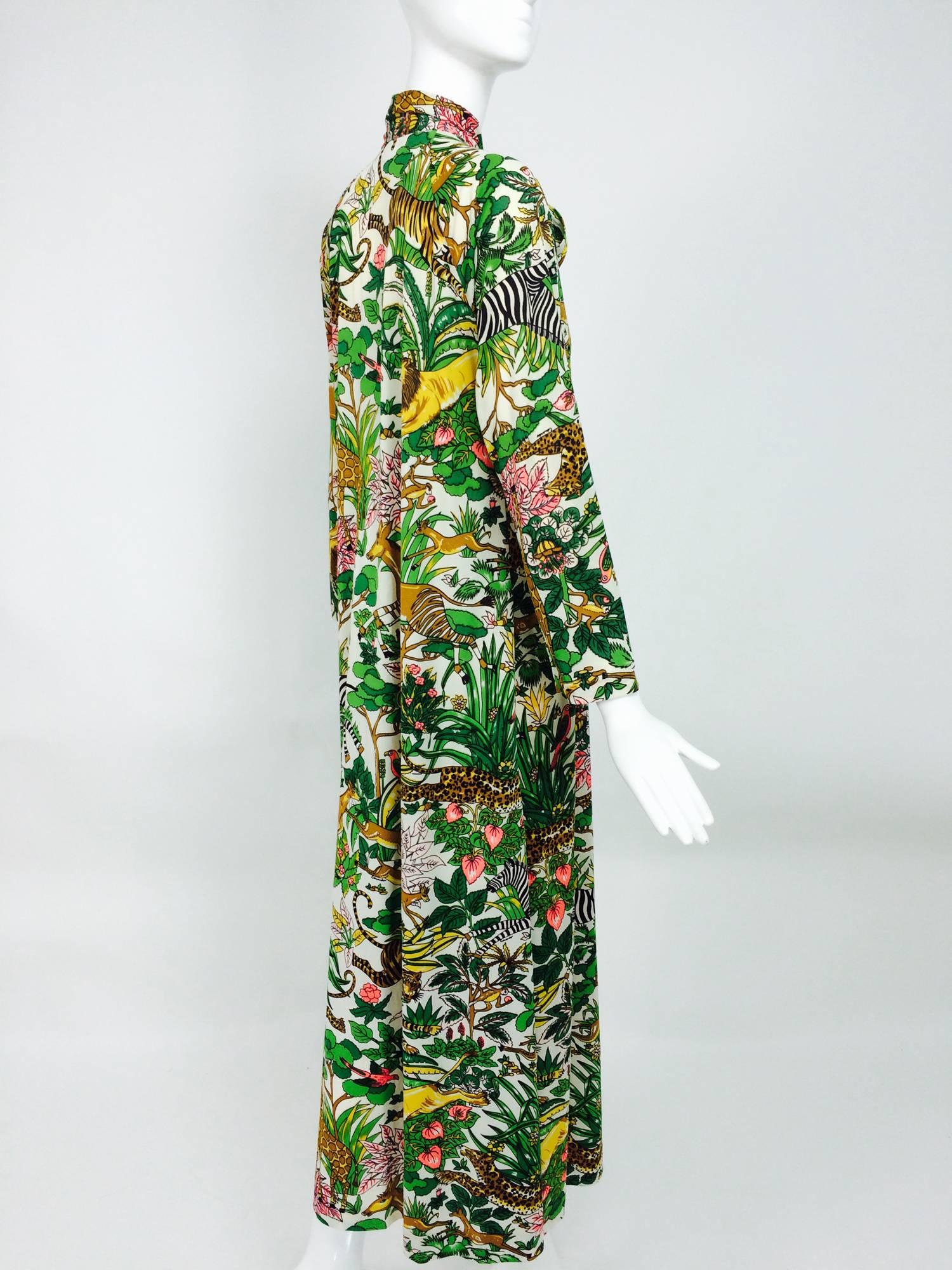 Eduardo Saks 5th Ave. jungle print bow tie lounge maxi dress1970s...Signed "Eduardo" in the print & labeled Saks 5th Ave...Brightly printed with exotic flora & fauna with zebra, lions, tigers, monkeys, leopards, giraffes and