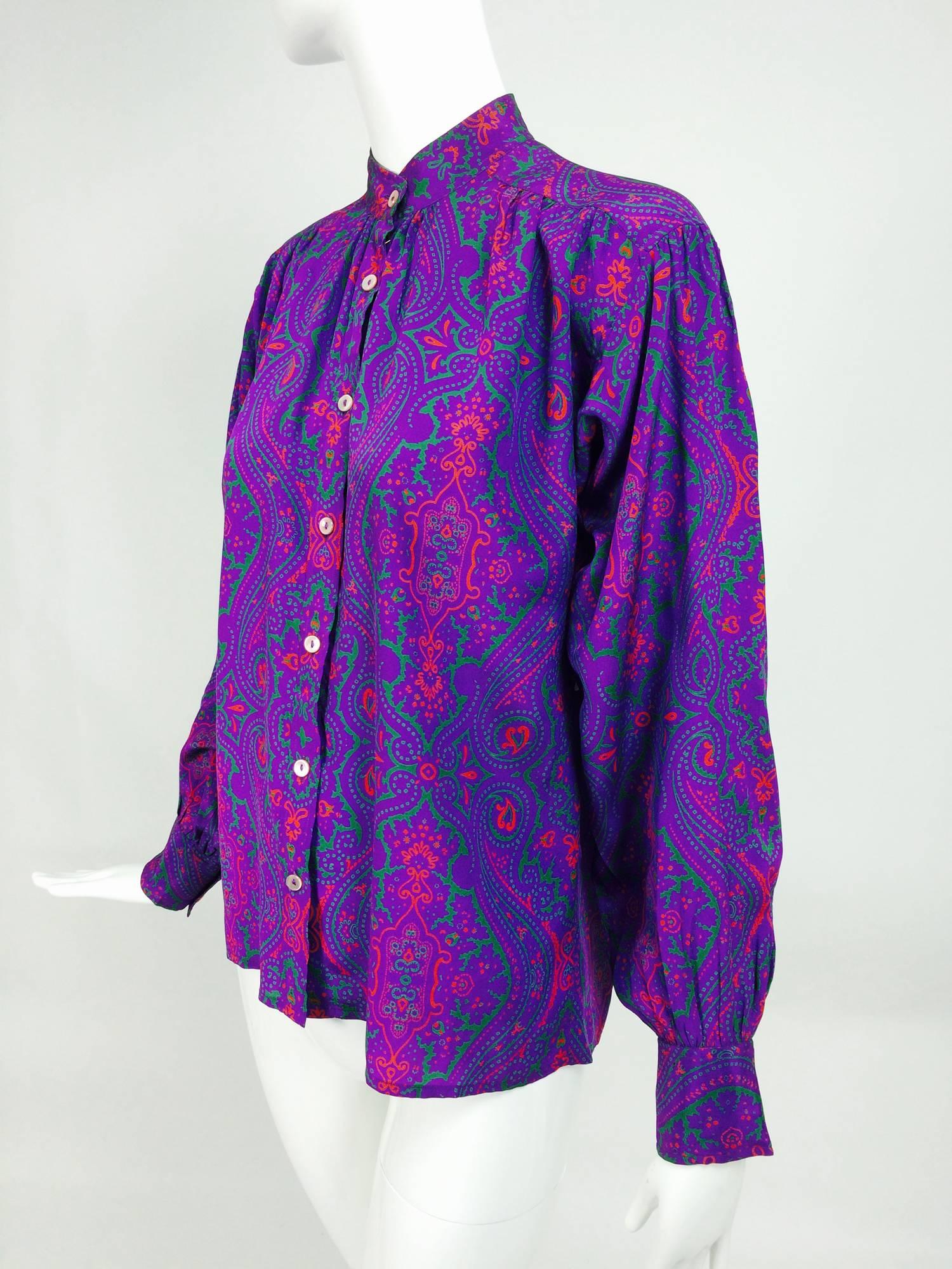 Yves Saint Laurent Moorish print silk blouse 1970s...Amazing print that looks like antique Moorish tiles...Purple & fuchsia...Banded collar button front blouse with long sleeves, yoke front and back and button cuffs...Marked size 38 fits like a