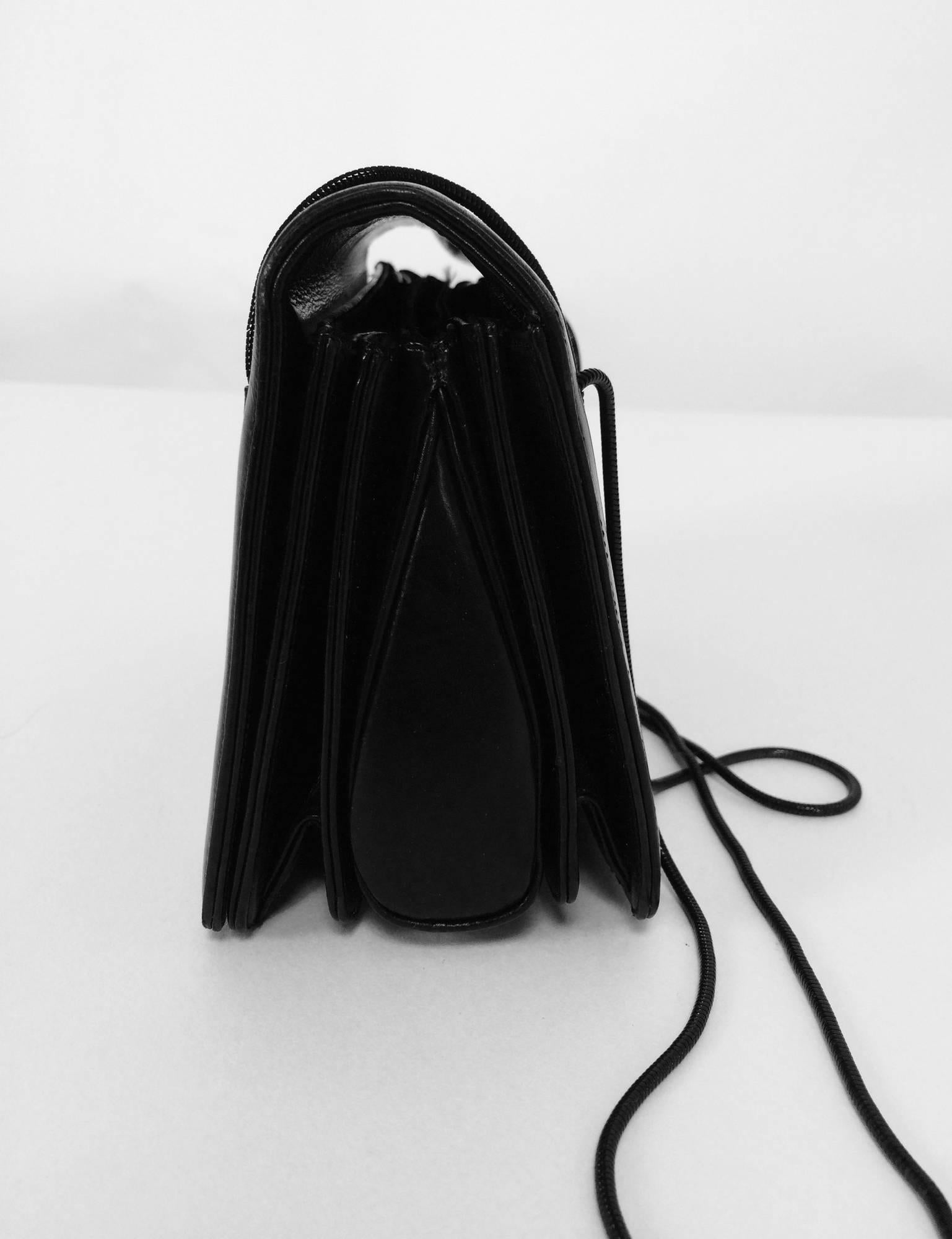 Black Judith Leiber glazed black calf flap front snake chain handle evening bag