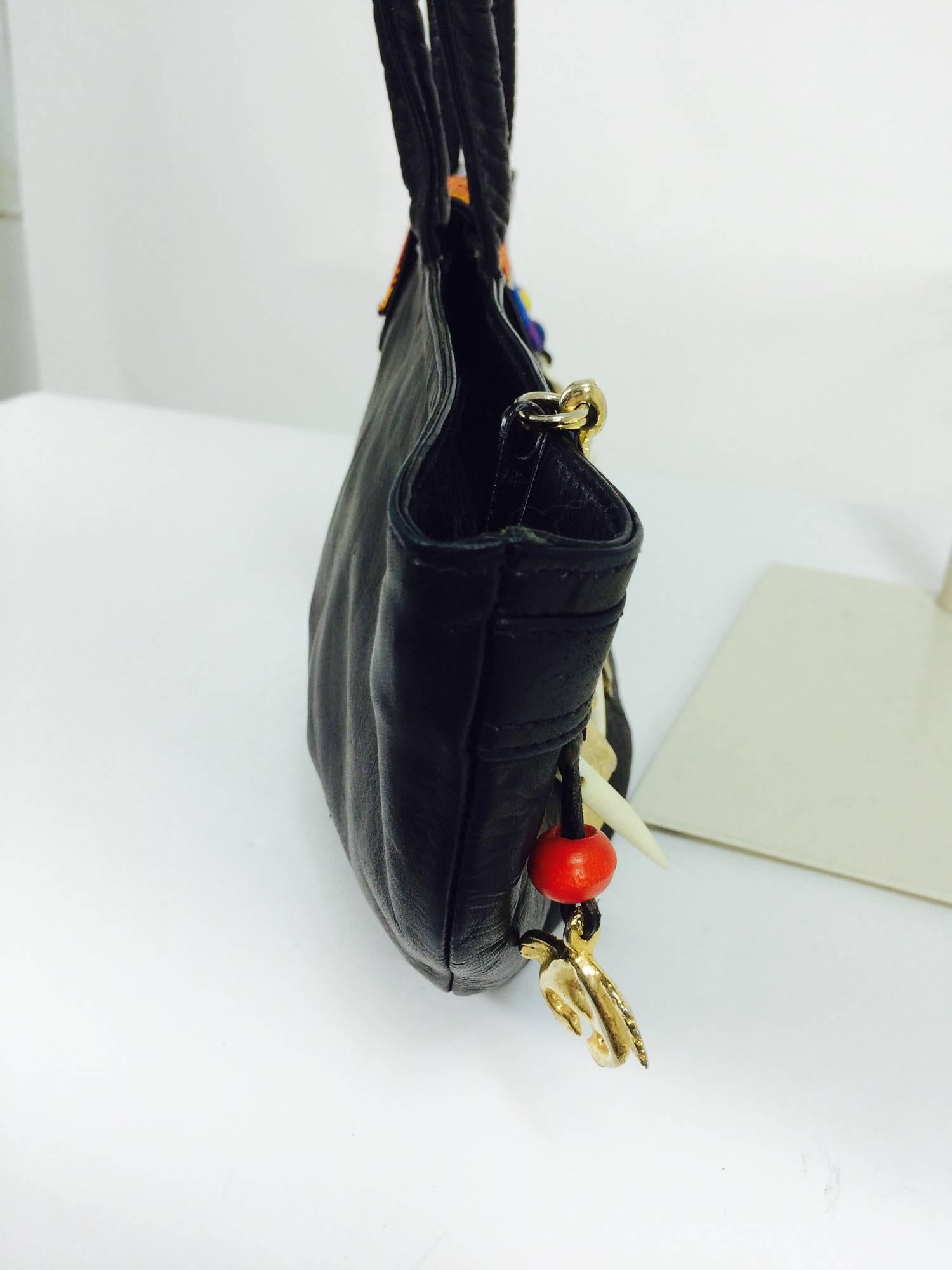 Novelty black leather unique shape tribal charm handbag  1