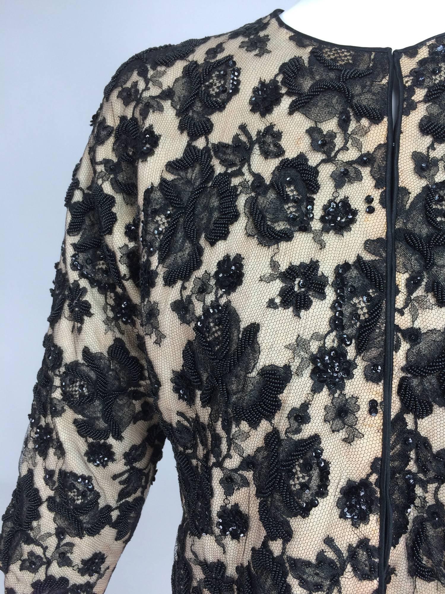 Beaded black lace & cashmere satin trimmed cardigan sweater 1950s...A beautiful sweater from the late 1950s...The cream cashmere sweater is overlaid with beaded black lace, the facings are finished with narrow bands of black satin...The sweater is