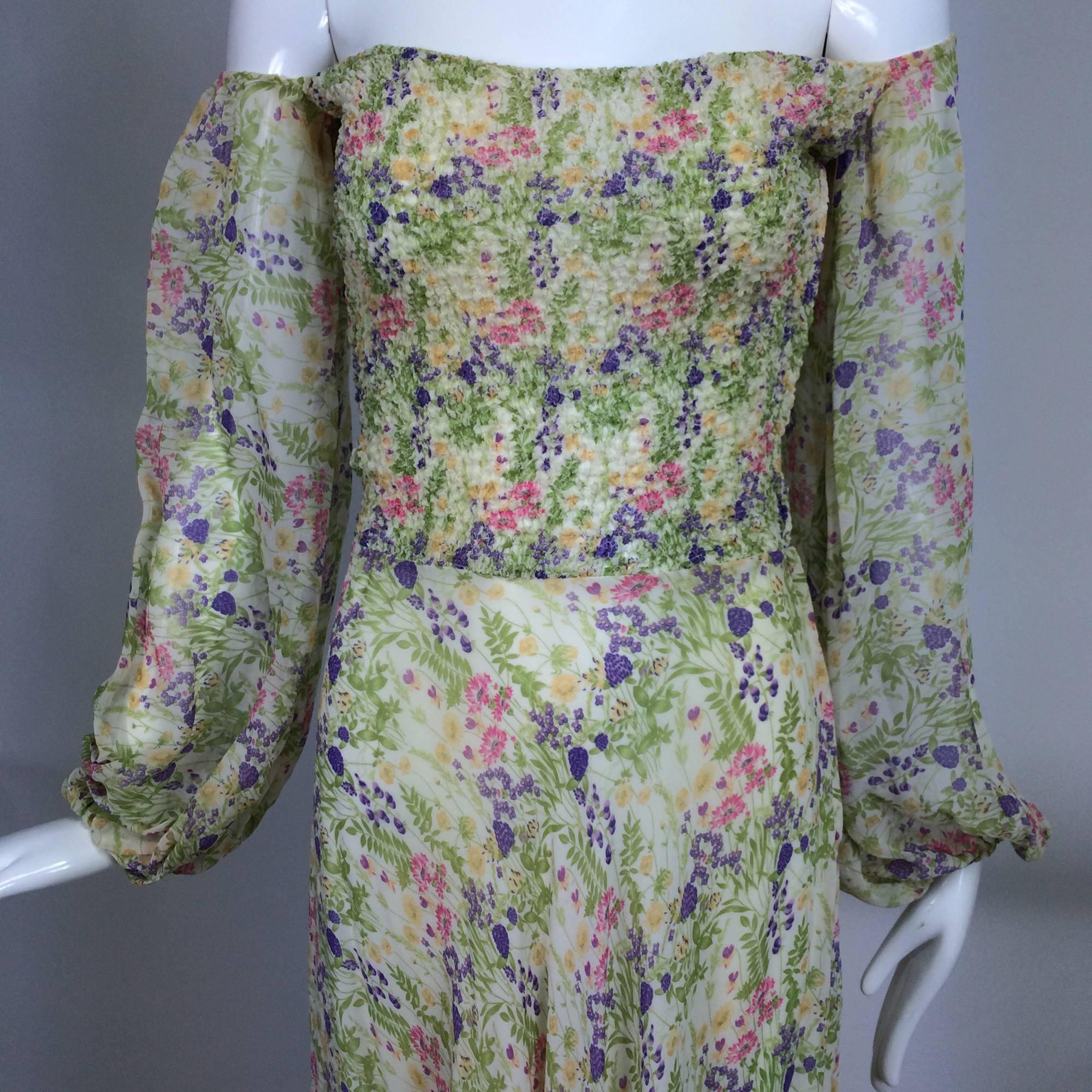 Vintage Judy Hornby London floral chiffon shirred bodice dress 1970s...
A sweet floral print in soft colours set on cream rayon chiffon...An earlier label probably before her exit to New York in the later 1970s...Hornby found great success in the