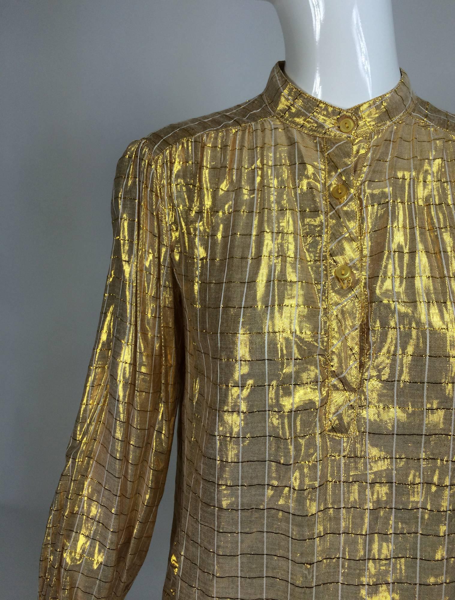 Vintage Gauze Shimmery Gold Yoke Back tunic Top India 1970s Unworn...Tunic length shirt in a light-as-air cotton fabric that is woven with gold metallic thread...Banded collar shirt has a yoke shoulder front & back, long sleeves with banded button
