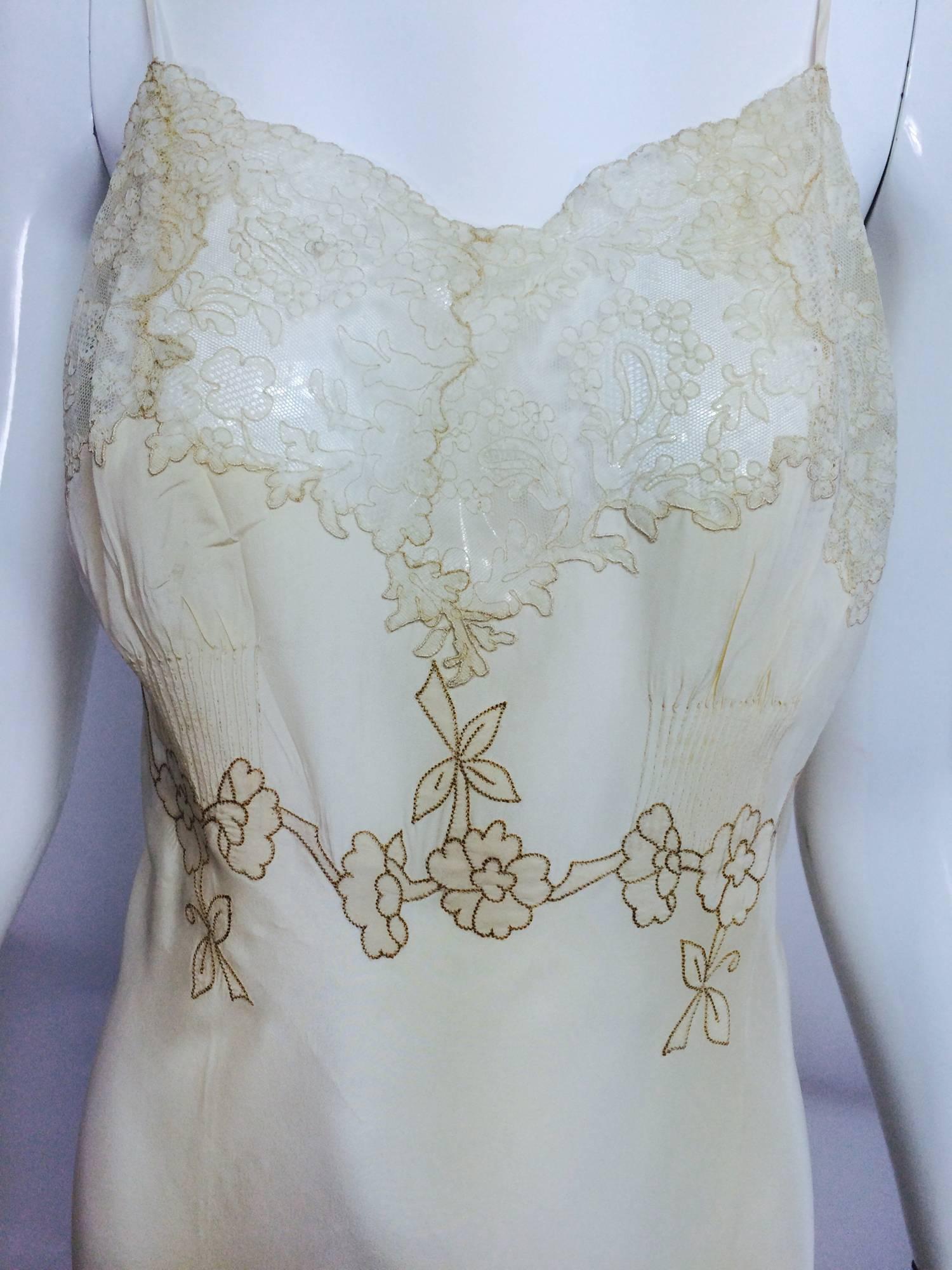 vintage French hand made embroidered champagne silk & lace slip 1950s...This beautiful slip is fitted and has exquisite hand work, embroidered detail and tiny pin tucks to fit at the bust...Trimmed in re embroidered Alencon lace, a beautiful lace