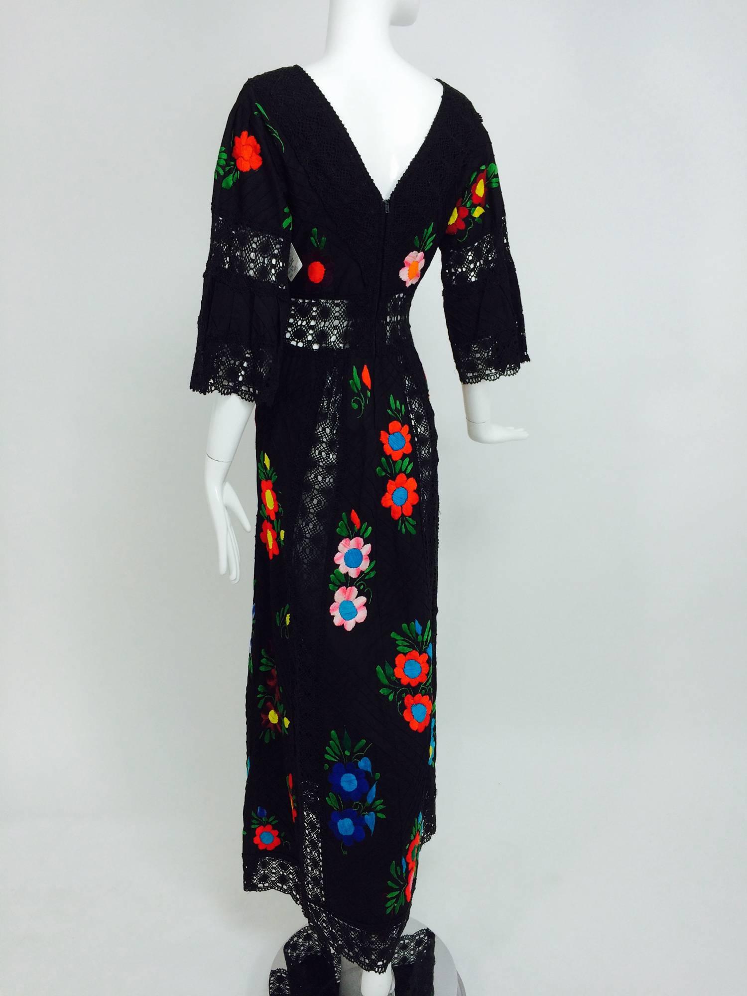 Vintage colourfully embroidered black cotton & lace Mexican maxi dress 1970s In Excellent Condition In West Palm Beach, FL