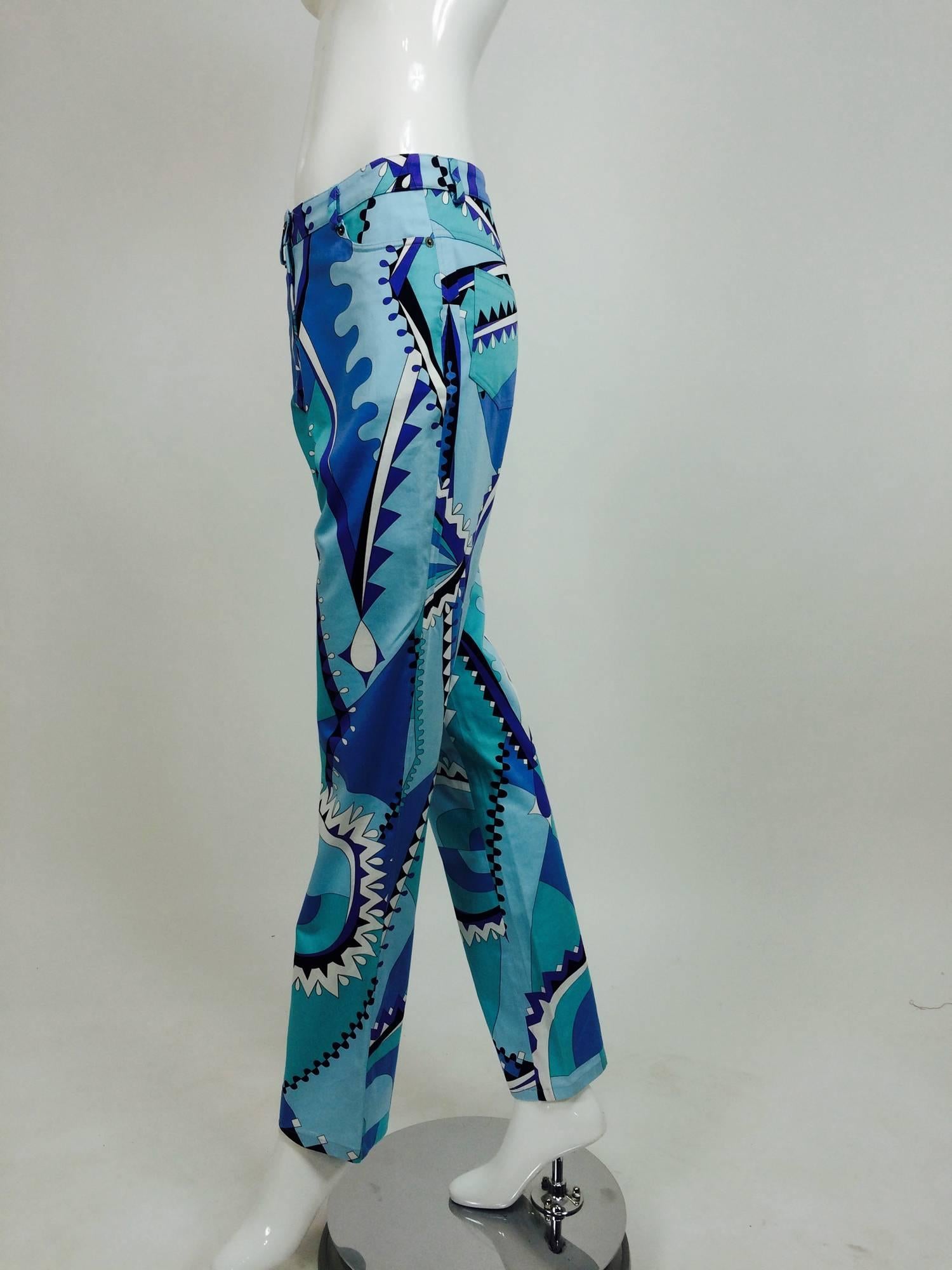 Bessi jean style trousers in vivid blues, aqua, purple, white and black...Geometric design...Slightly fared...Fly front...Unworn, new with tags...Marked size 8

In excellent wearable condition... All our clothing is dry cleaned and inspected for