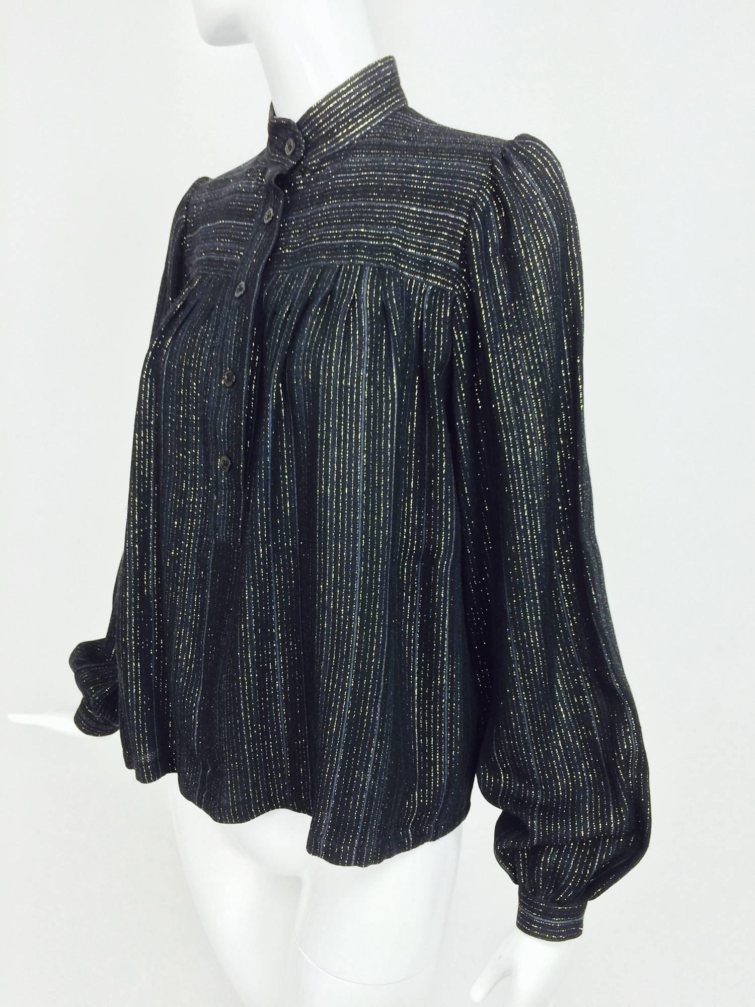 Vintage Yves Saint Laurent YSL black metallic stripe gauze peasant top from the 1970s...Long sleeve blouse has full sleeves with button cuffs...Yoke front and back with button front placket, the blouse falls semi full below yoke...Band collar...Fits