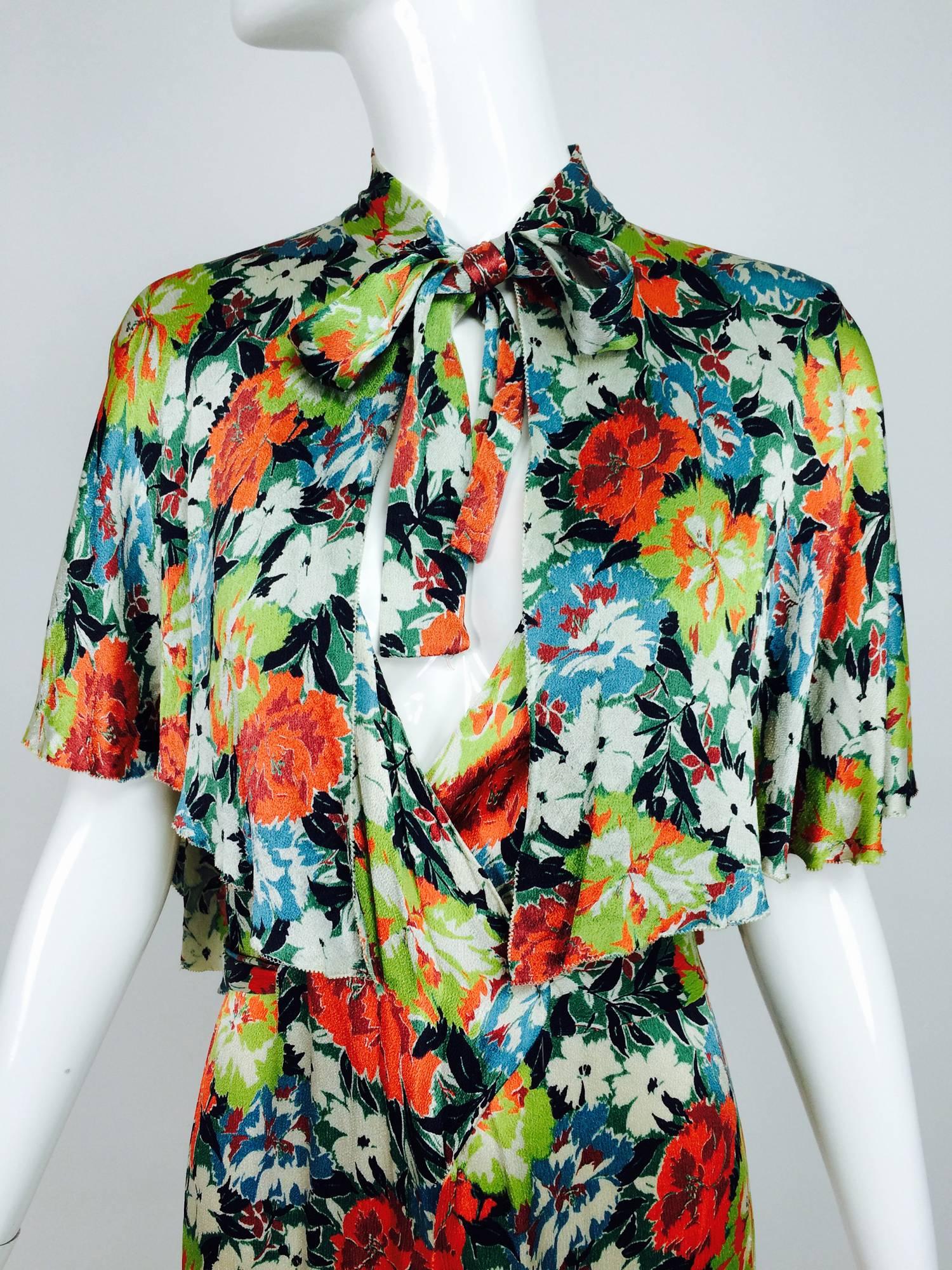 Vintage floral printed silk crepe satin beach pajamas and cape from the 1920s...Bright floral print on a beautifully draping fabric...Pajamas, introduced to the western world somewhere around 1870, by British Colonials, have remained popular