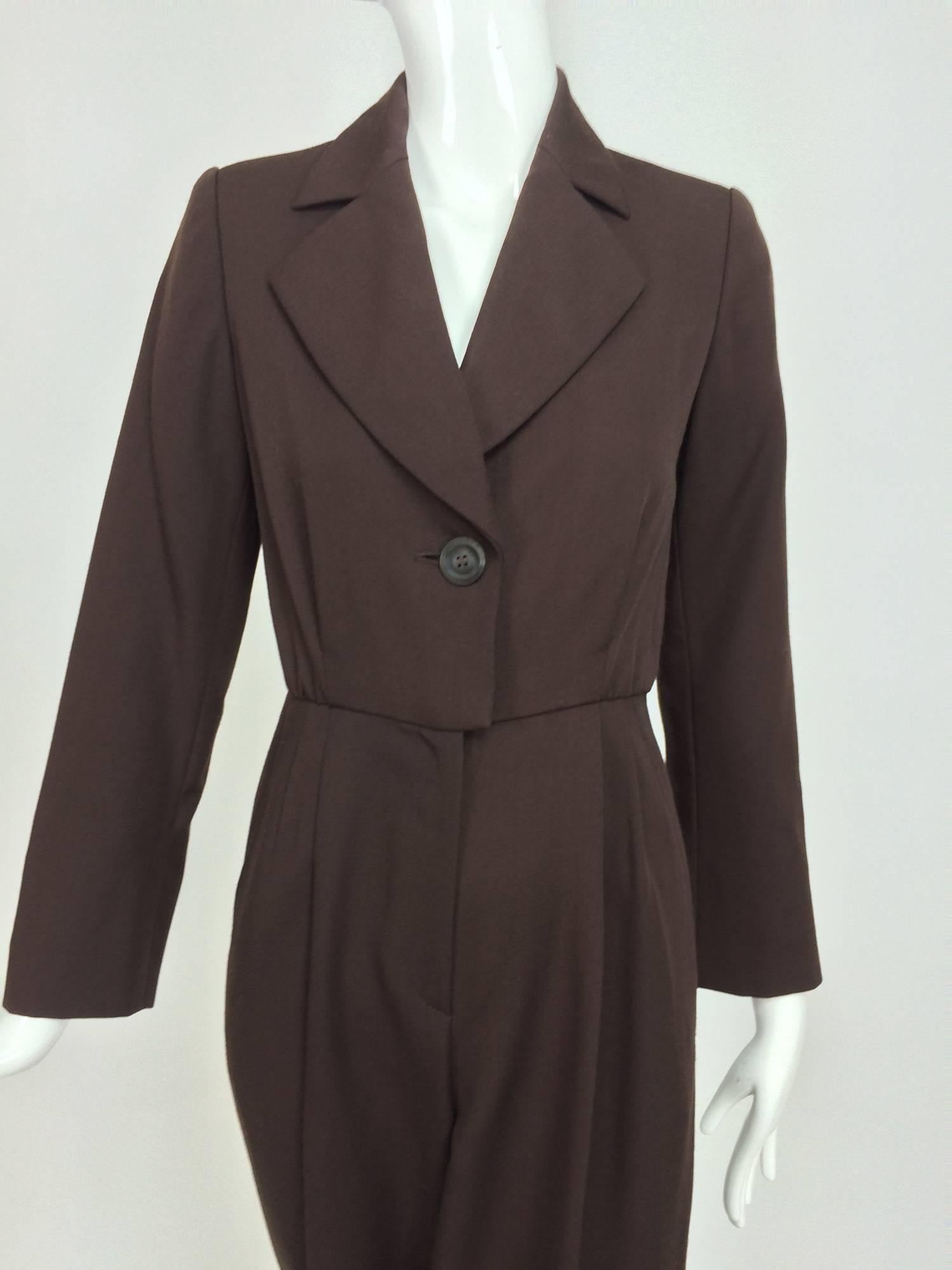 Vintage Yves Saint Laurent YSL brown wool tuxedo jumpsuit 1970s...One piece jumpsuit with the look of a tuxedo/le smoking...Step in, single button at the front with a deep V neckline and notched lapels...Long sleeves with single button cuffs...The