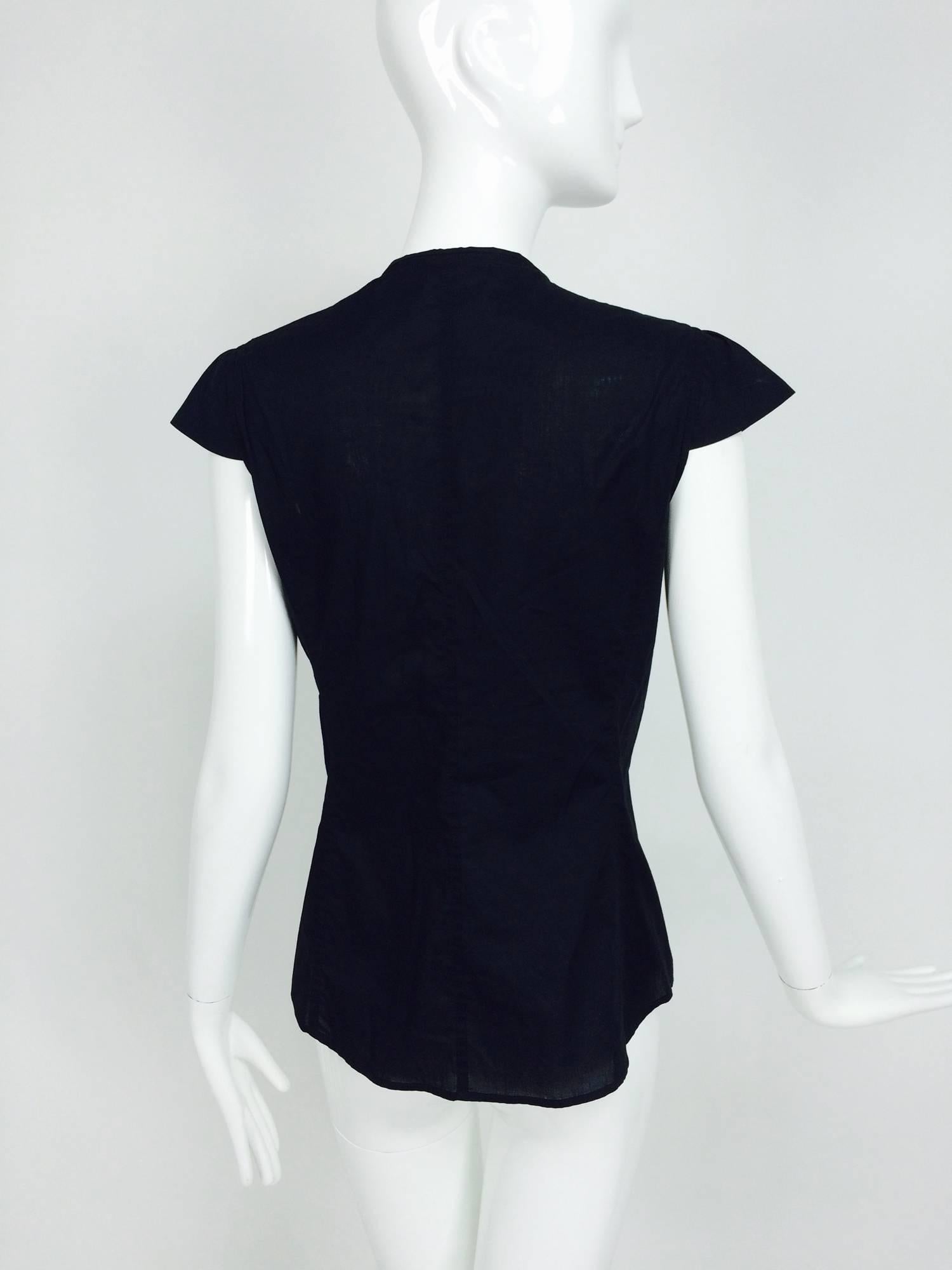 Yves Saint Laurent black polished cotton cap sleeve crochet ruffle front blouse In Excellent Condition In West Palm Beach, FL