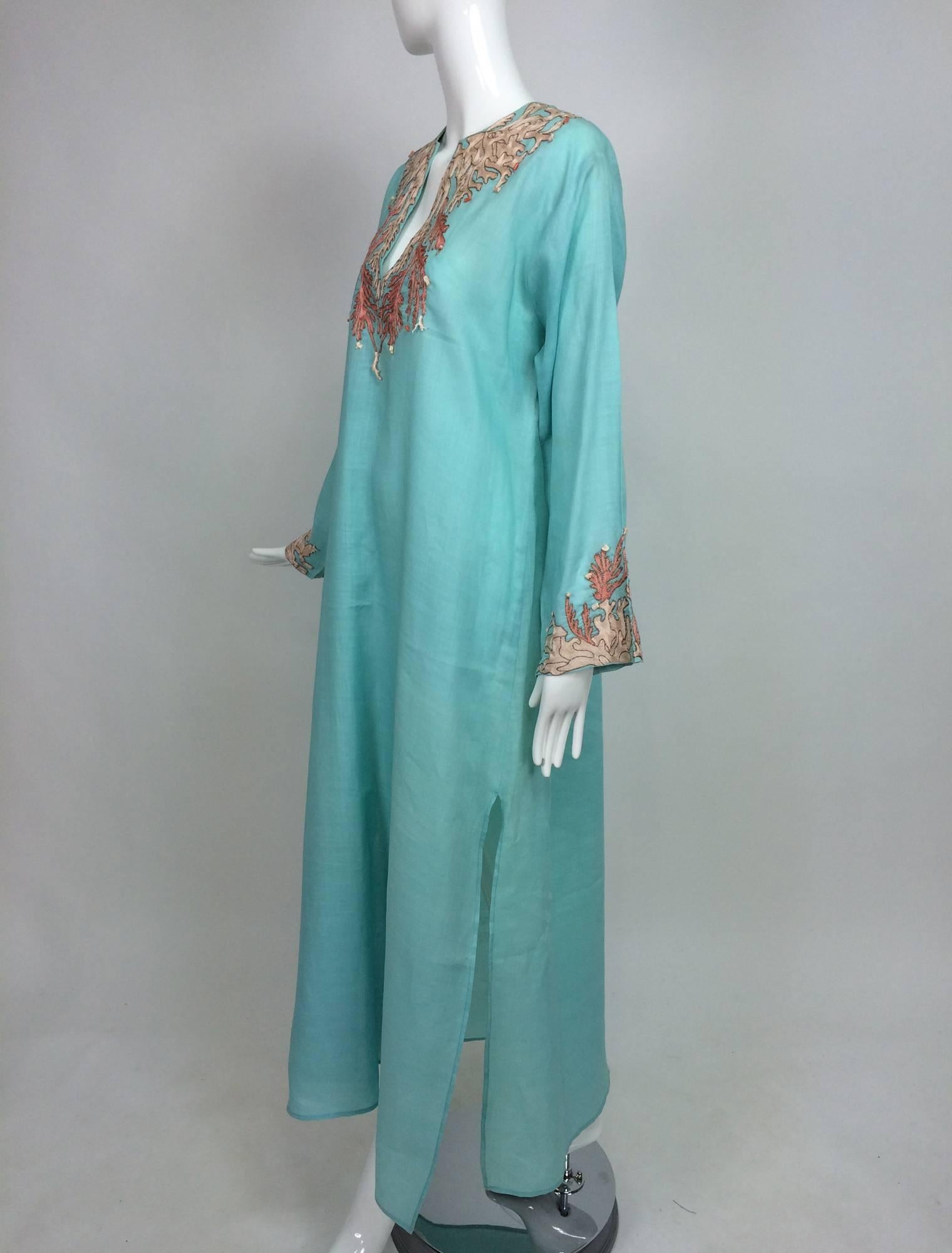 Jeannie McQueeny Aqua linen coral embroidered caftan L...Mid weight aqua linen with detailed coral design embroidery at the neck and cuffs done in shades of pale cream to coral pink, with gold outlining, there are attached pieces of real branch