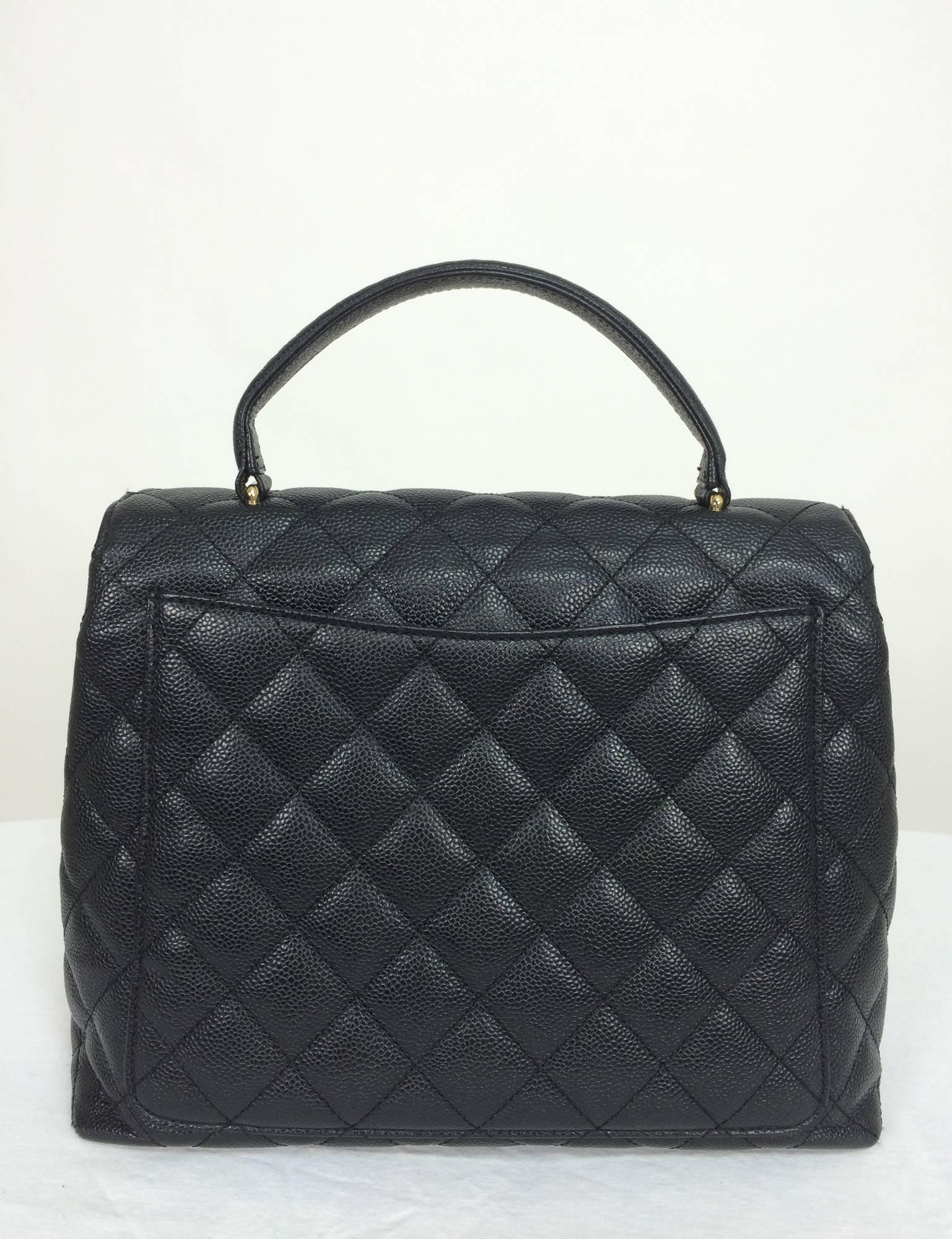 Vintage Chanel top handle flap front black caviar leather handbag 4