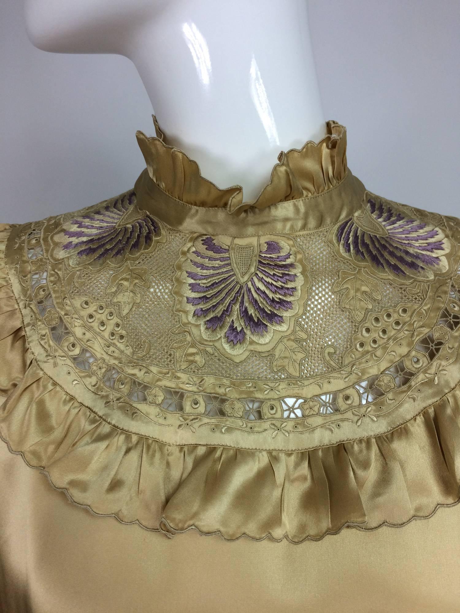Vintage Pierre Cardin intricately embroidered gold silk satin blouse from the 1970s...As the first Westerner to break into China's fashion world, Cardin once likened his experience to that of explorer Marco Polo, visiting China in1978...In 1979,