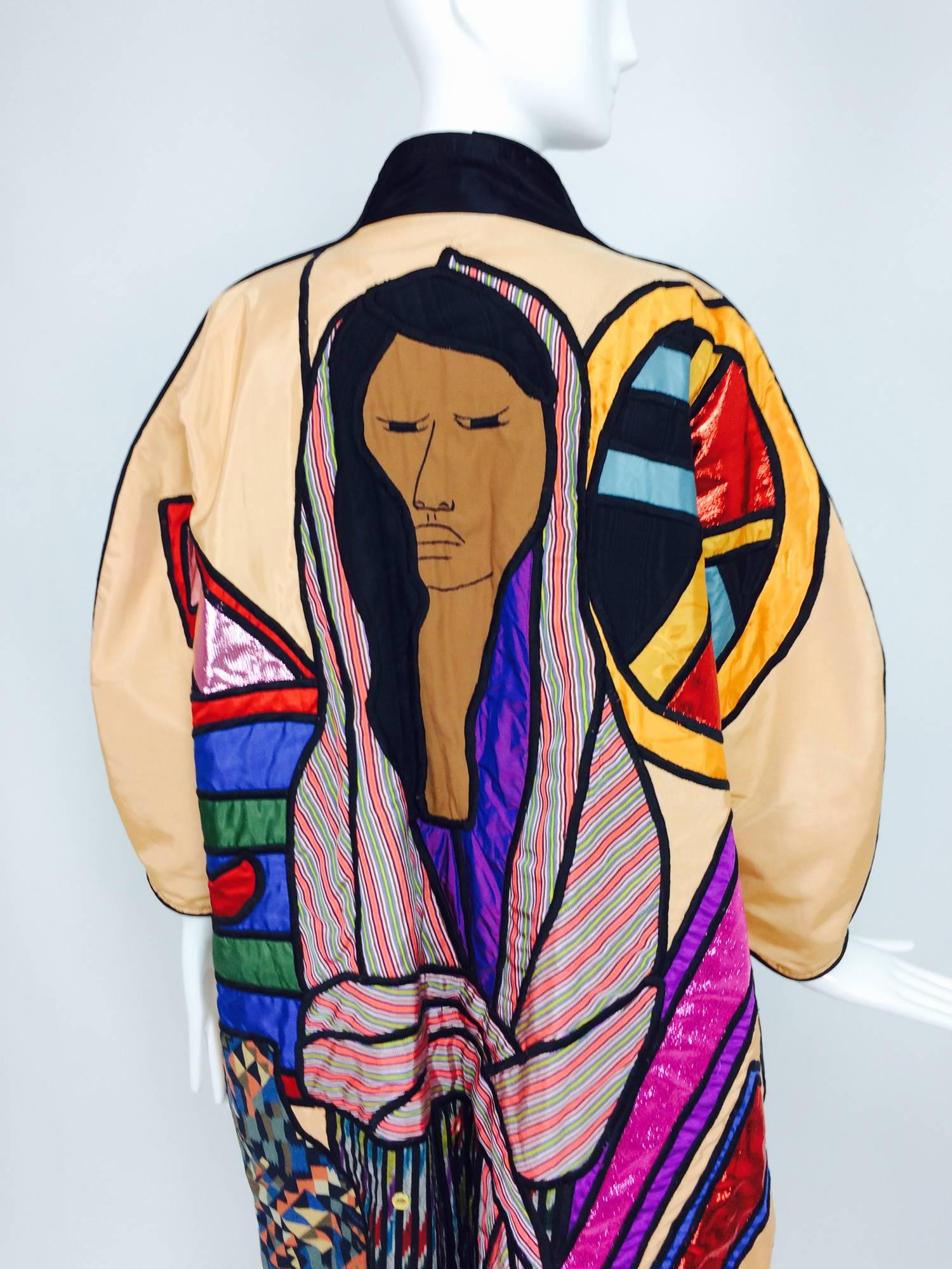 Amazing, Judith Roberts art to wear applique faces coat 1980s, the base of the coat is gold faille, it is appliqued with faces at each side front and one large womens face wrapped in a shawl on the back...Labeled La Coleccion Judith Roberts Hecho en