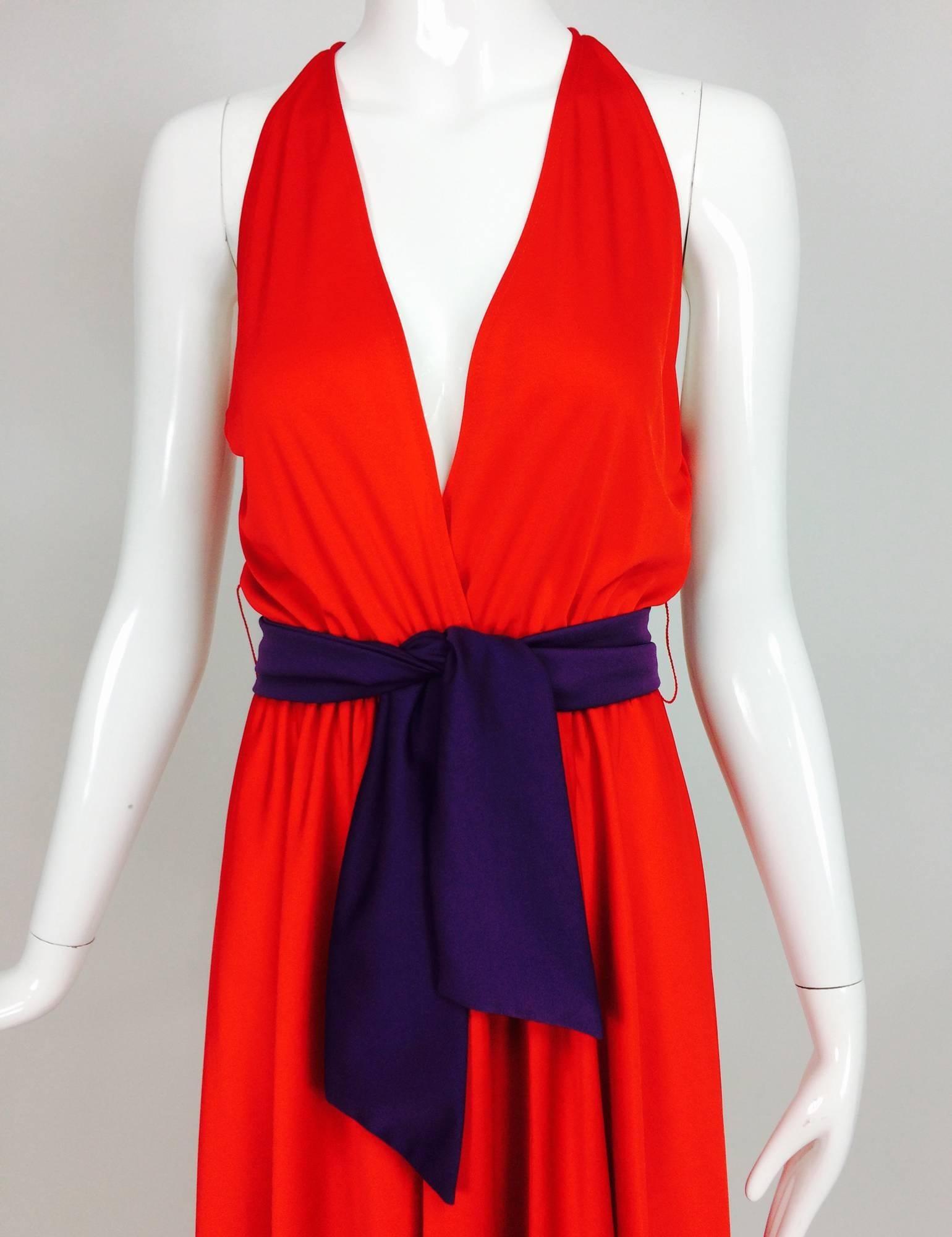 Vintage Halston silky red & purple jersey halter plunge wrap front, dip hem dress...This great dress is so easy to wear, it wraps at the waist front with cased elastic and two bar hooks for exact fit...Sleeveless halter neckline plunges at the