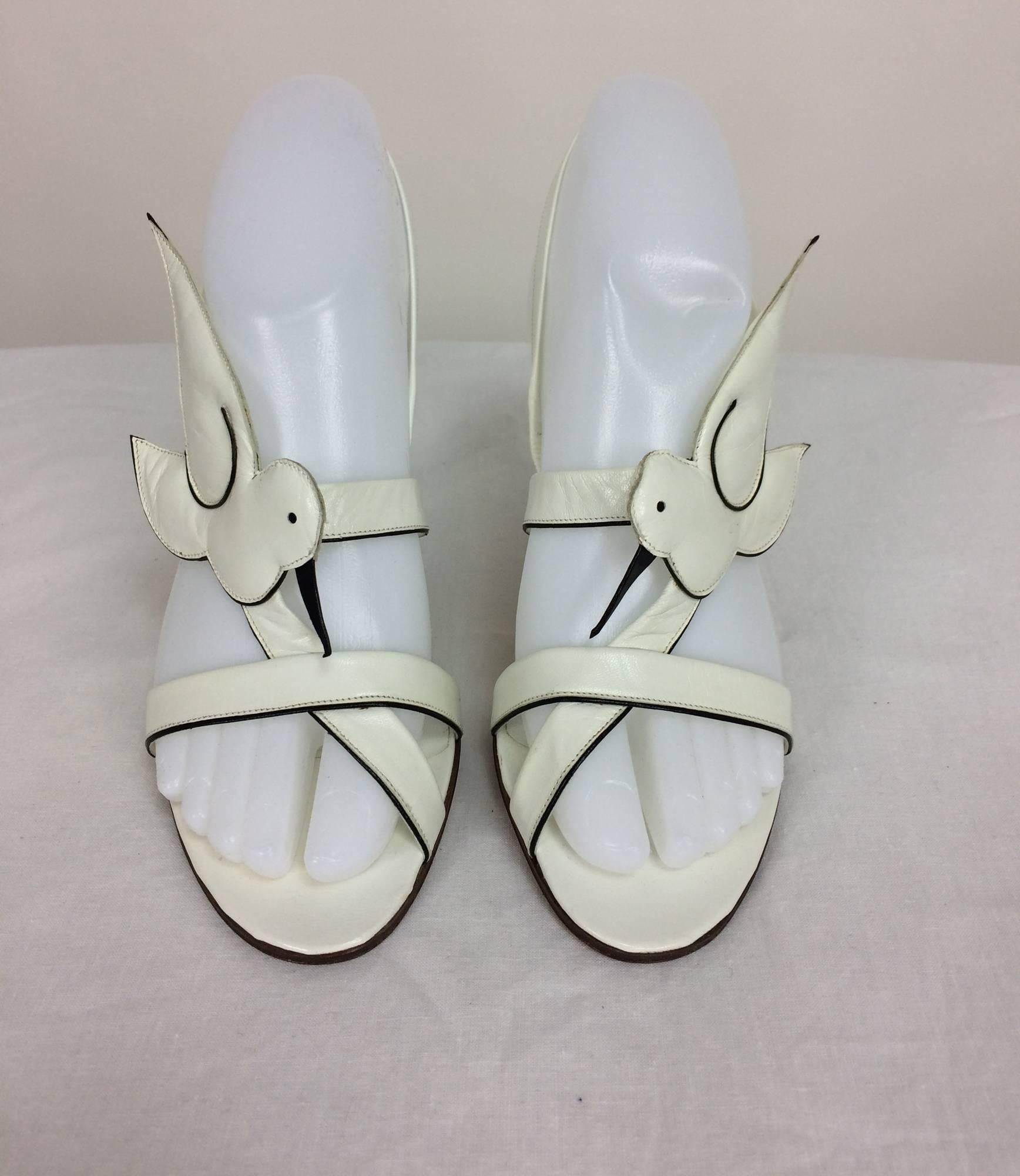 Roger Vivier white leather winged birds sandals unworn 37 1/2M...Amazing shoes...Please see the last 2 photos the small piece of leather covered elastic at each side is cracked near the sole, it would be impossible to see when worn...