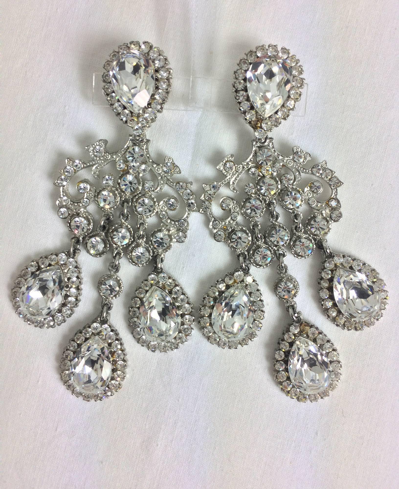 Massive rhinestone chandelier clip back earrings...Silver metal set with extra large, large and small crystal rhinestones...Clip backs.
Approx. 4 3/4