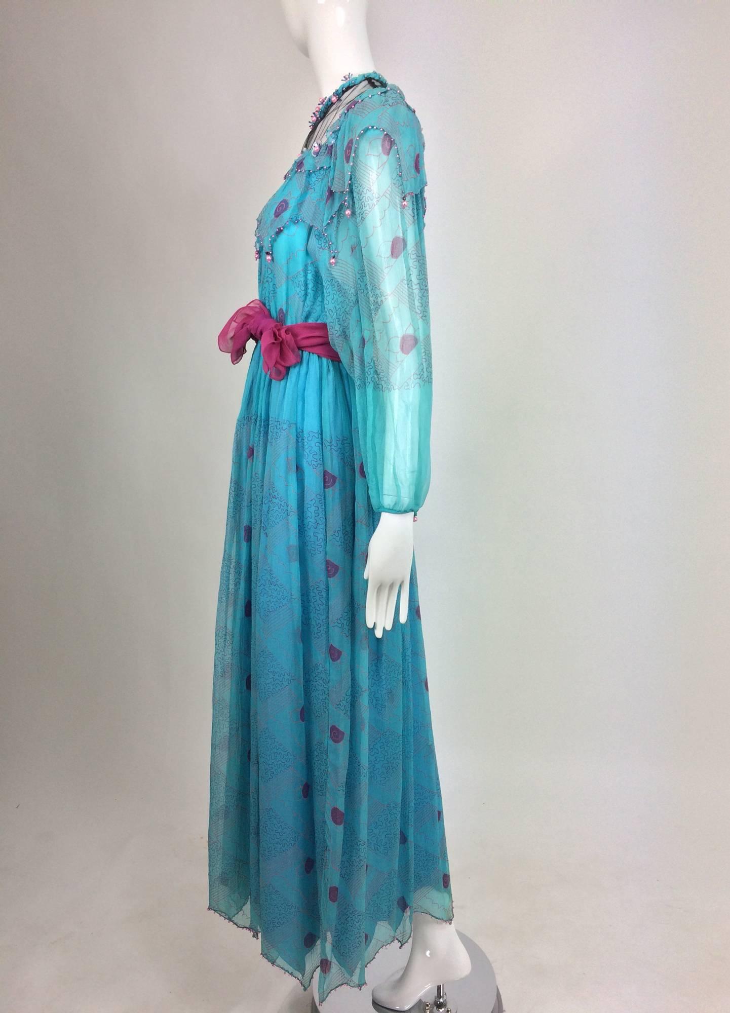
Zandra Rhodes hand printed turquoise silk chiffon beaded dress from the 1970s marked 