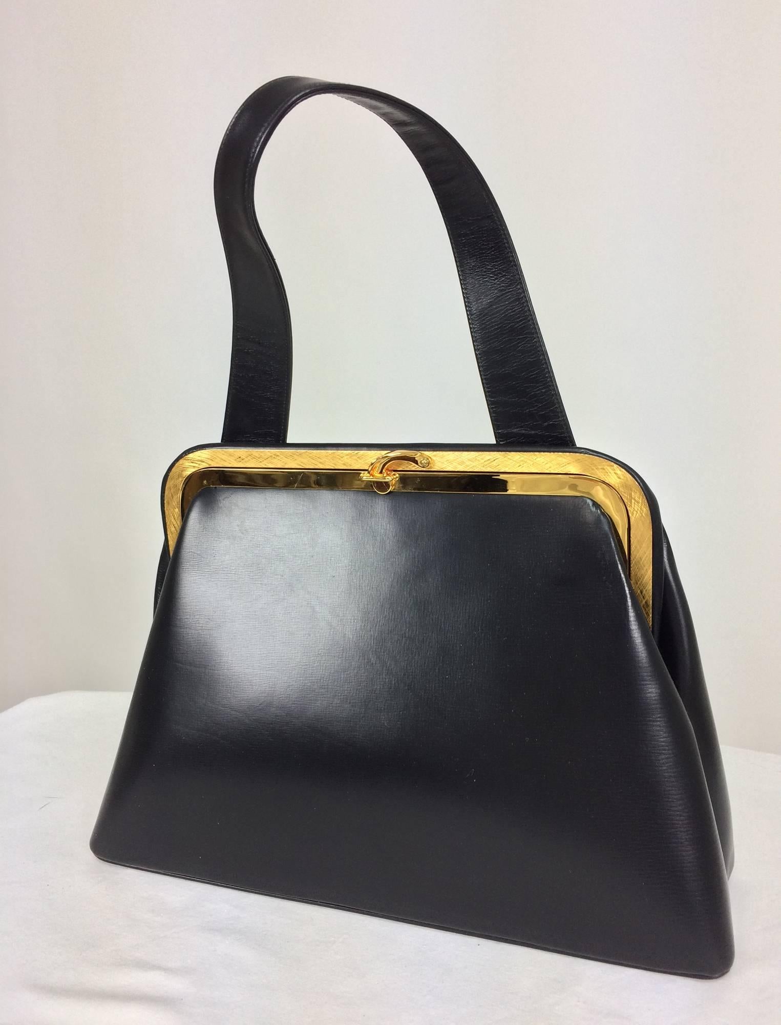 Bienen-Davis black box calf structured handbag with gold hardware 1950s...Beautiful vintage bag, looks barely, if ever worn...Brushed gold frame with latch closure...Handle is set at the top back of the bag, it is wide where it is attached to the