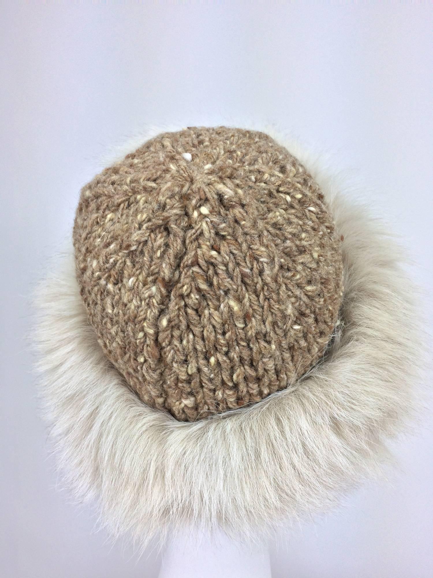 Lillie Rubin Fox fur and tweed knit hat 1970s unworn...A chunky knitted cap (feels like a wool blend), is trimmed with a wide band of cream fox fur...Knit stretches...Fits a size medium. In excellent unworn condition 