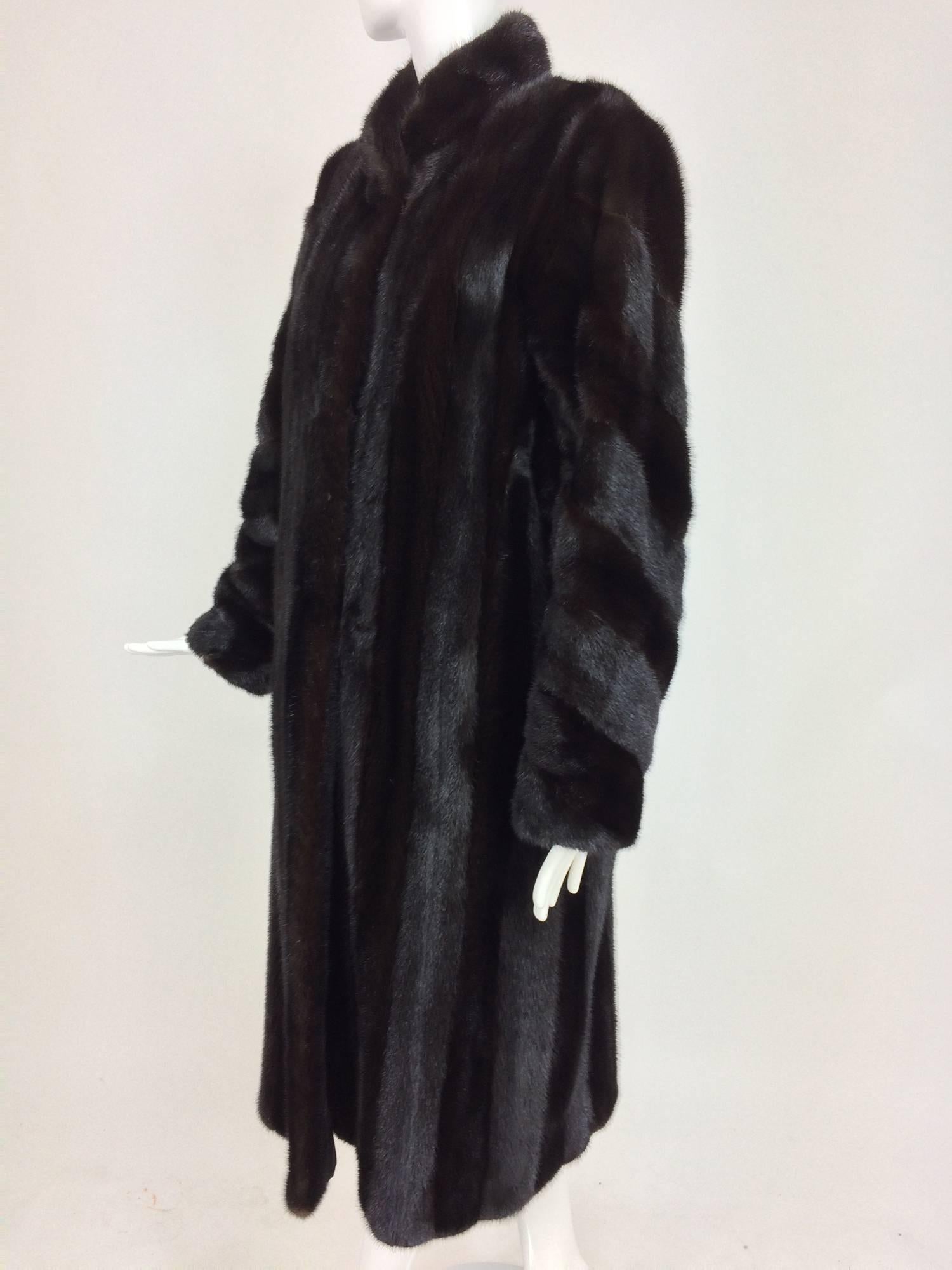 Birger Christensen Dark mink fur coat full length female skins...Birger Christensen is one of the finest furriers in the world...This beautiful coat is so soft, the fur is amazing and very very dark brown...The pelts are set in a vertical stripe,