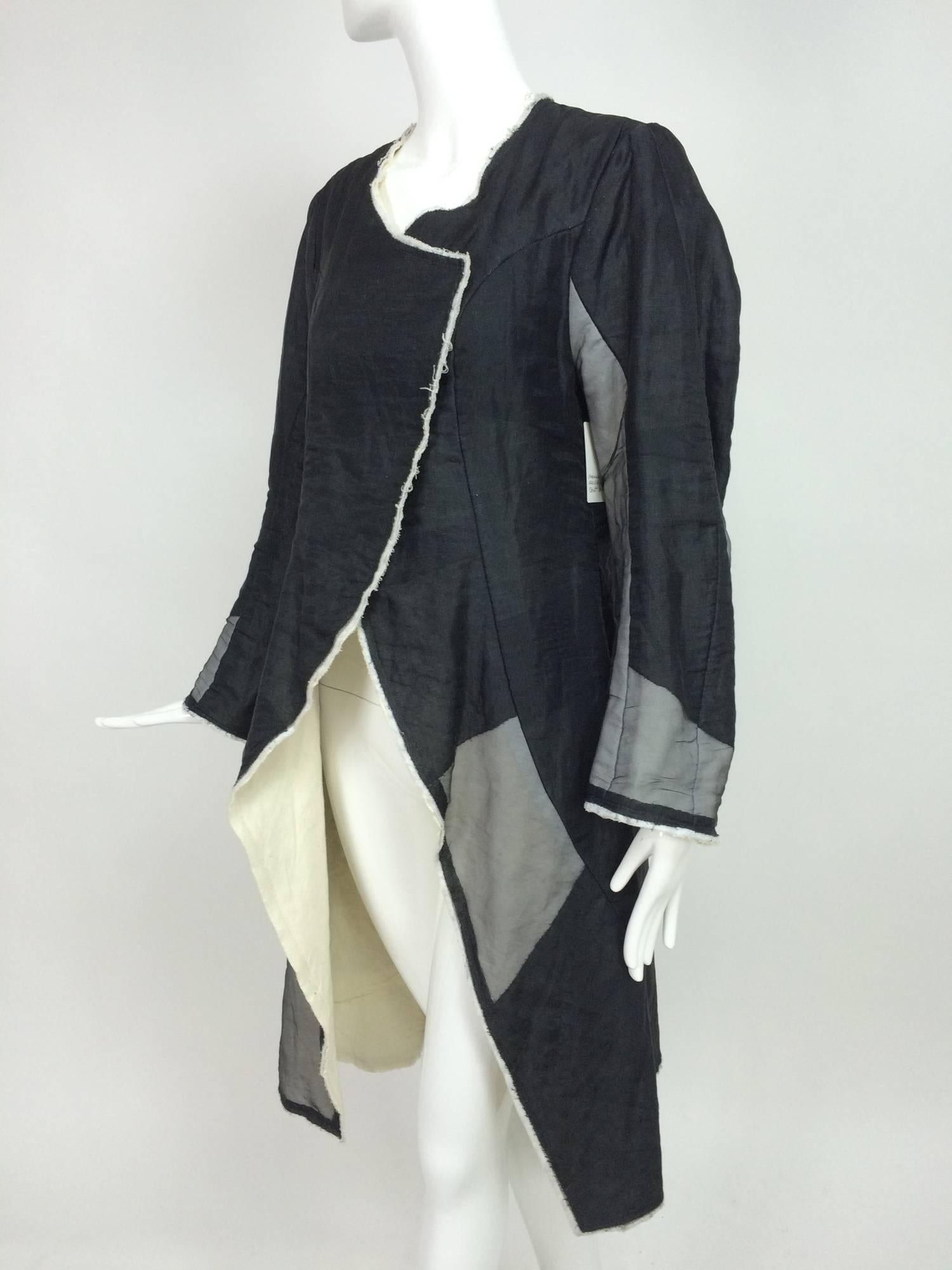 Nobu Nakano Japan black and grey patch sparkle organza and muslin cutaway Coat...Art to wear, open front coat with cross over upper front, that closes with snaps, the coat is cutaway at the hip to the hem...Long tapered sleeves...The body of the