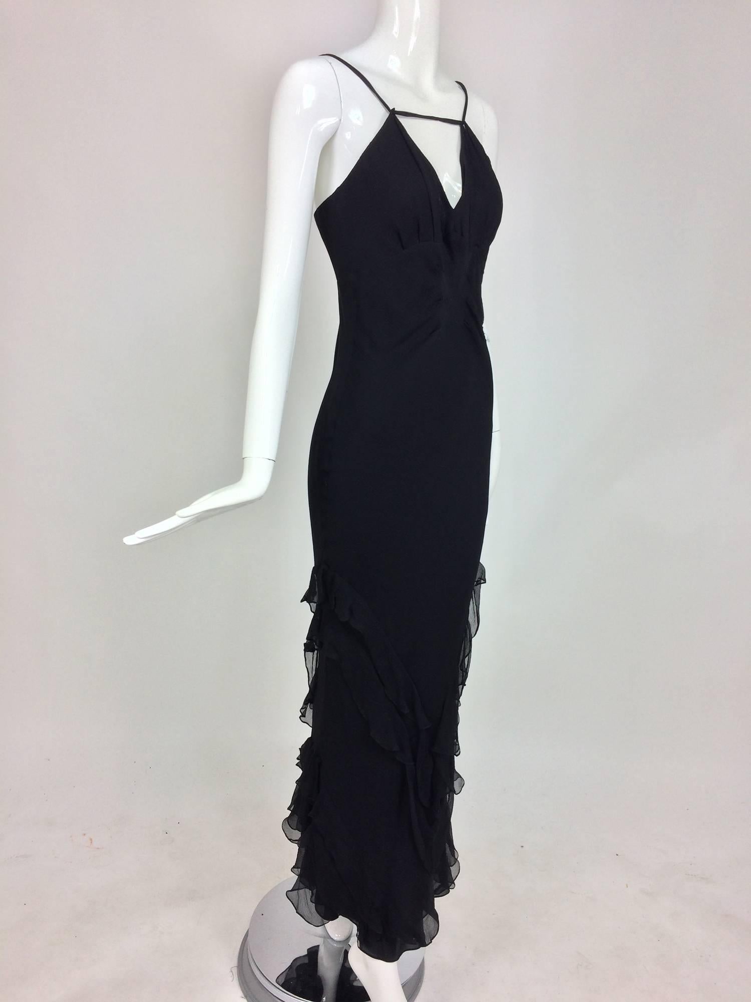 J. Mendel halter neck black tiered ruffle chiffon evening dress...Sexy halter neck gown has chiffon cords that adjust to fit a larger bust then the mannequin we uses, has...Bias cut gown hugs the body...The lower skirt has flirty ruffles...The dress